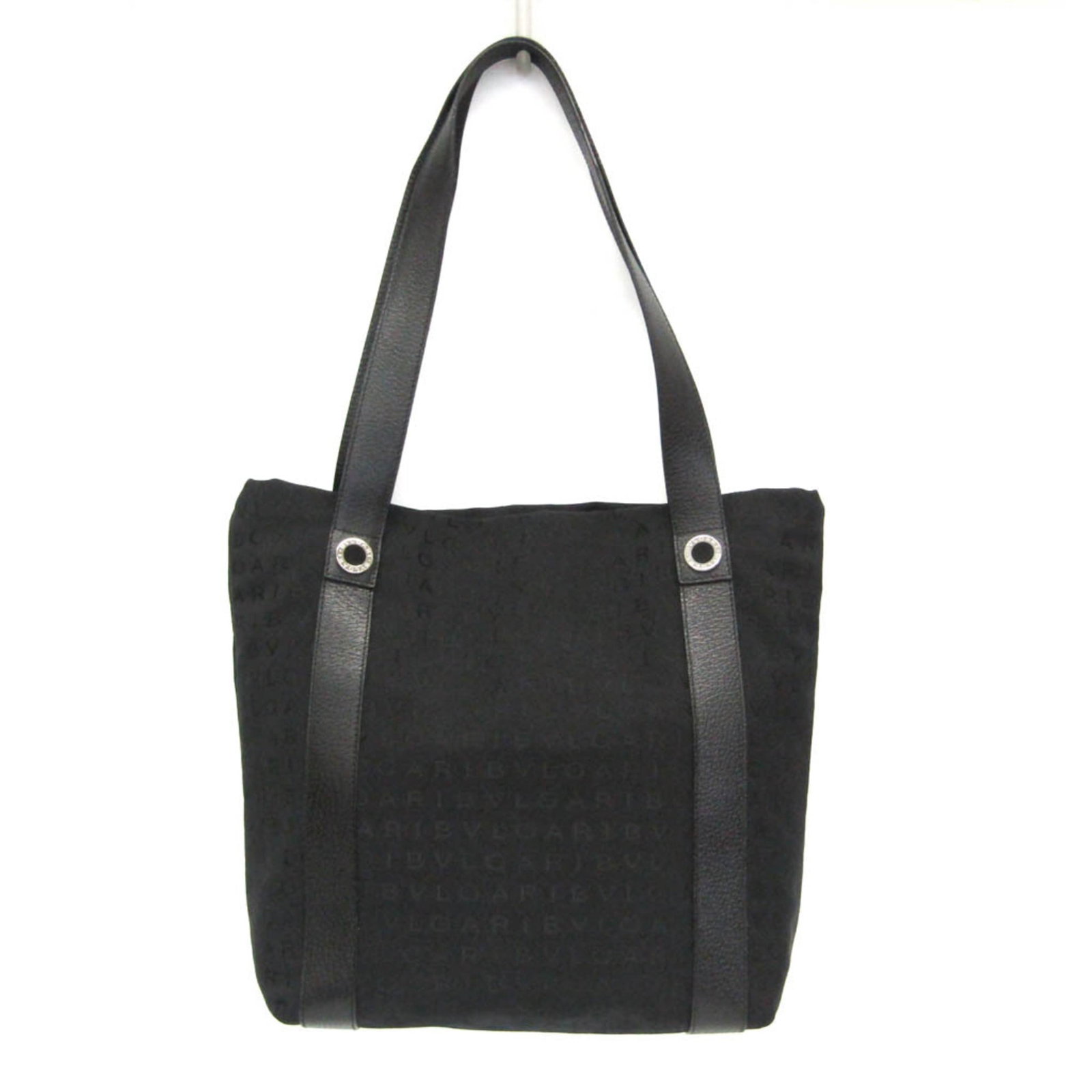 Bvlgari Tote Bag Canvas Leather: Bvlgari Tote Bag Canvas Leather Canvas and leather blend in sleek black, defining the Bvlgari tote bag's understated elegance. A versatile open design features an inner zipper pocket and a pouch for