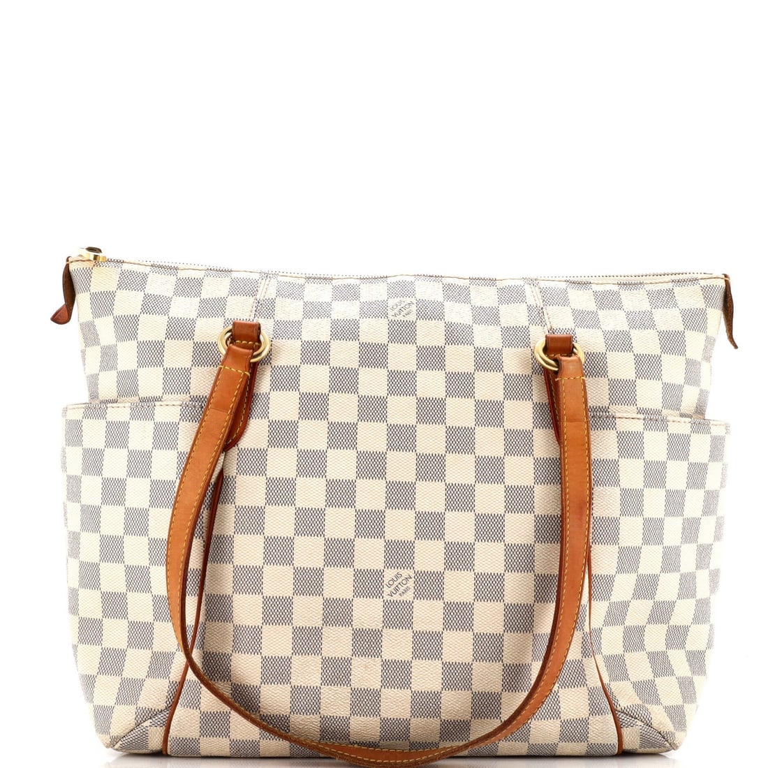 Totally Handbag Louis Vuitton Damier MM: Totally Handbag Louis Vuitton Damier MM Totally Handbag's Louis Vuitton Damier MM tote boasts a classic white canvas exterior with gold hardware, featuring the iconic Damier print. With its spacious