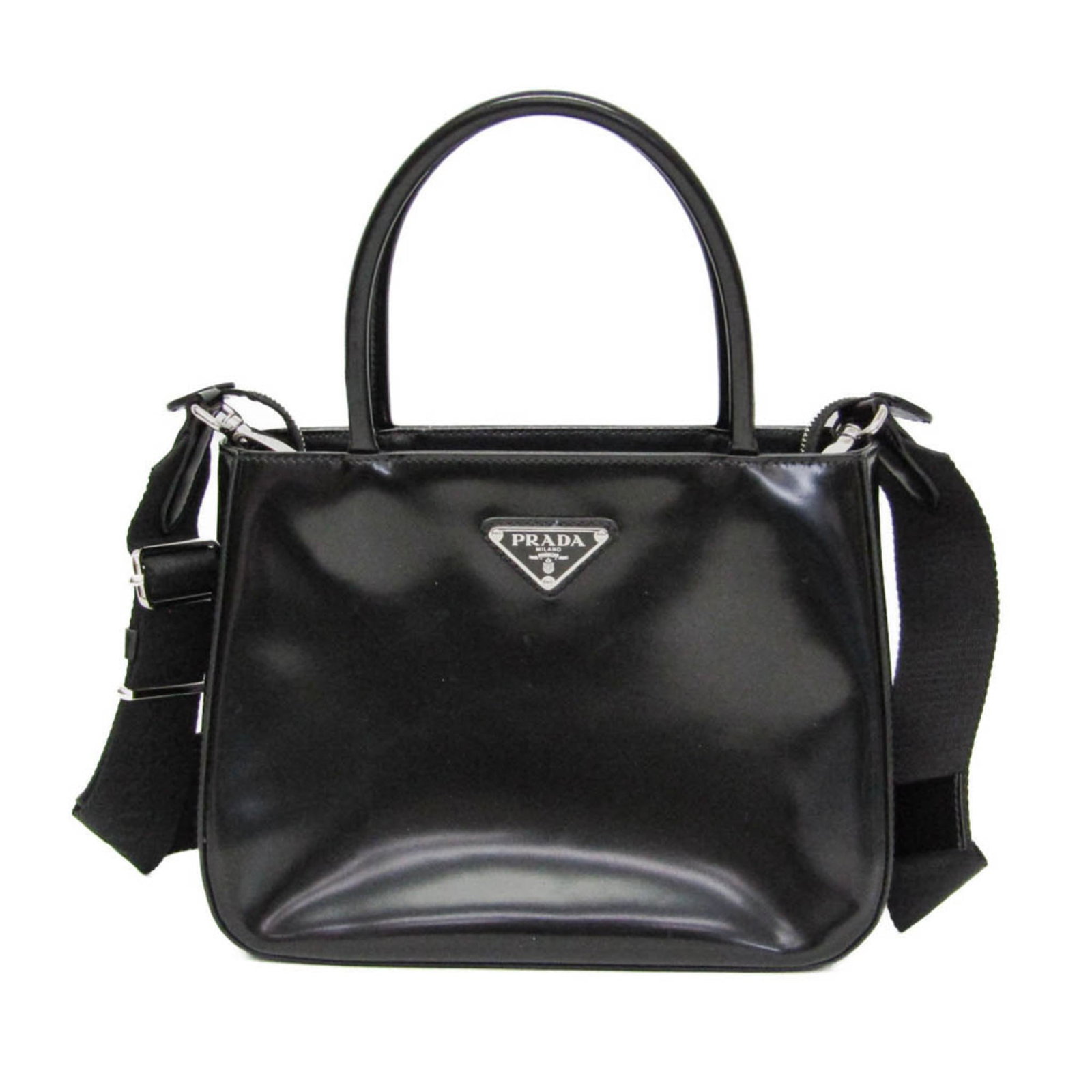 Handbag Leather Bag Shoulder Prada: Handbag Leather Bag Shoulder Prada Black leather shoulder bag from Prada, featuring a zipper closure and open interior pocket. Measuring 17cm x 22cm x 9cm, it has adjustable straps that can be worn in