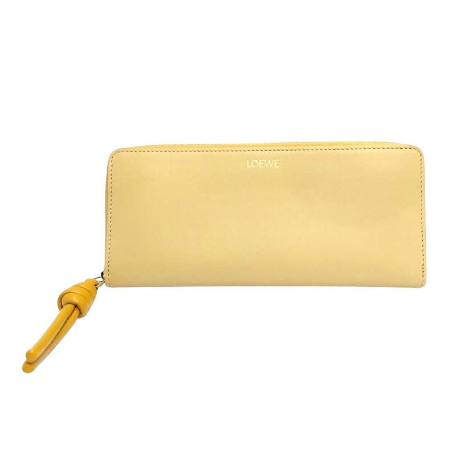 Loewe Long Wallet (Bi-Fold) Leather: Loewe Long Wallet (Bi-Fold) Leather The Loewe Long Wallet (Bi-Fold) Leather features a classic design with a yellow calfskin exterior, measuring 9cm x 19.5cm x 1.5cm. This used bi-fold wallet