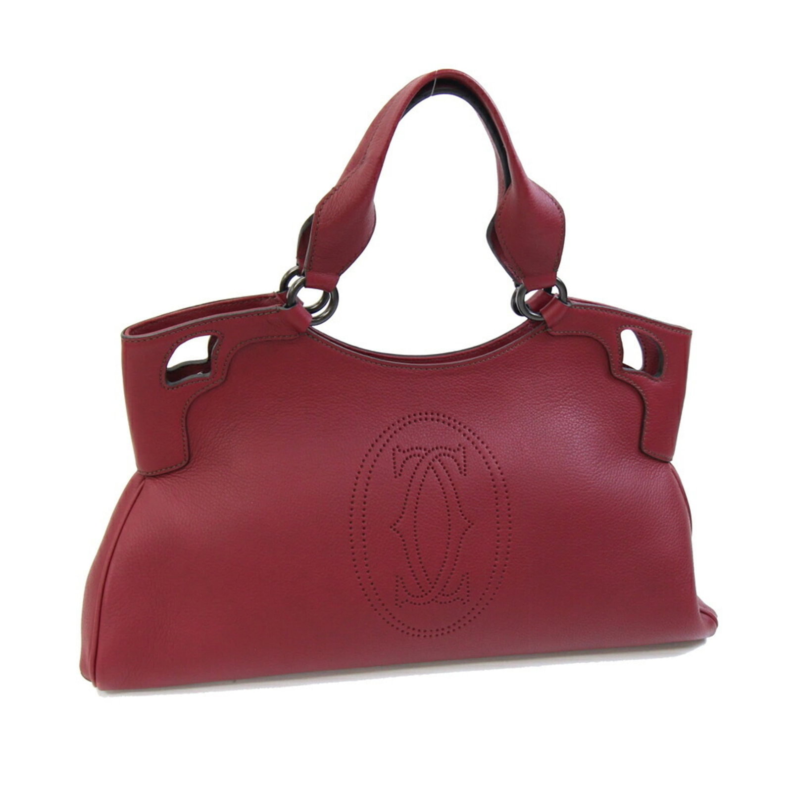 Handbag tote leather bag Cartier: Handbag tote leather bag Cartier Red wine red leather Cartier tote bag with zipper pocket 1 and inner zipper pocket, measuring 25cm x 44cm x 13cm. The bag features a few traces of usage, some