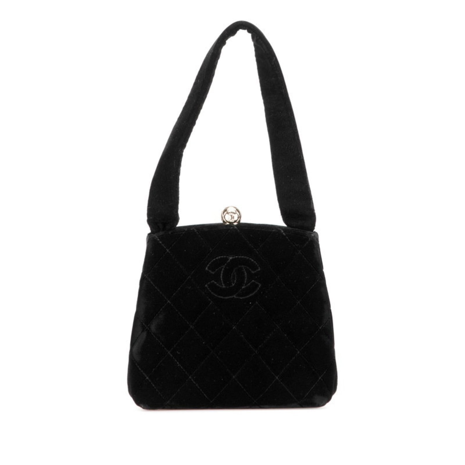 Handbag Chanel: Handbag Chanel This black Chanel handbag features a sleek design with a compact size, measuring 15cm x 15.5cm x 7cm. With traces of usage visible, it has developed scratches and dirt, but remains in