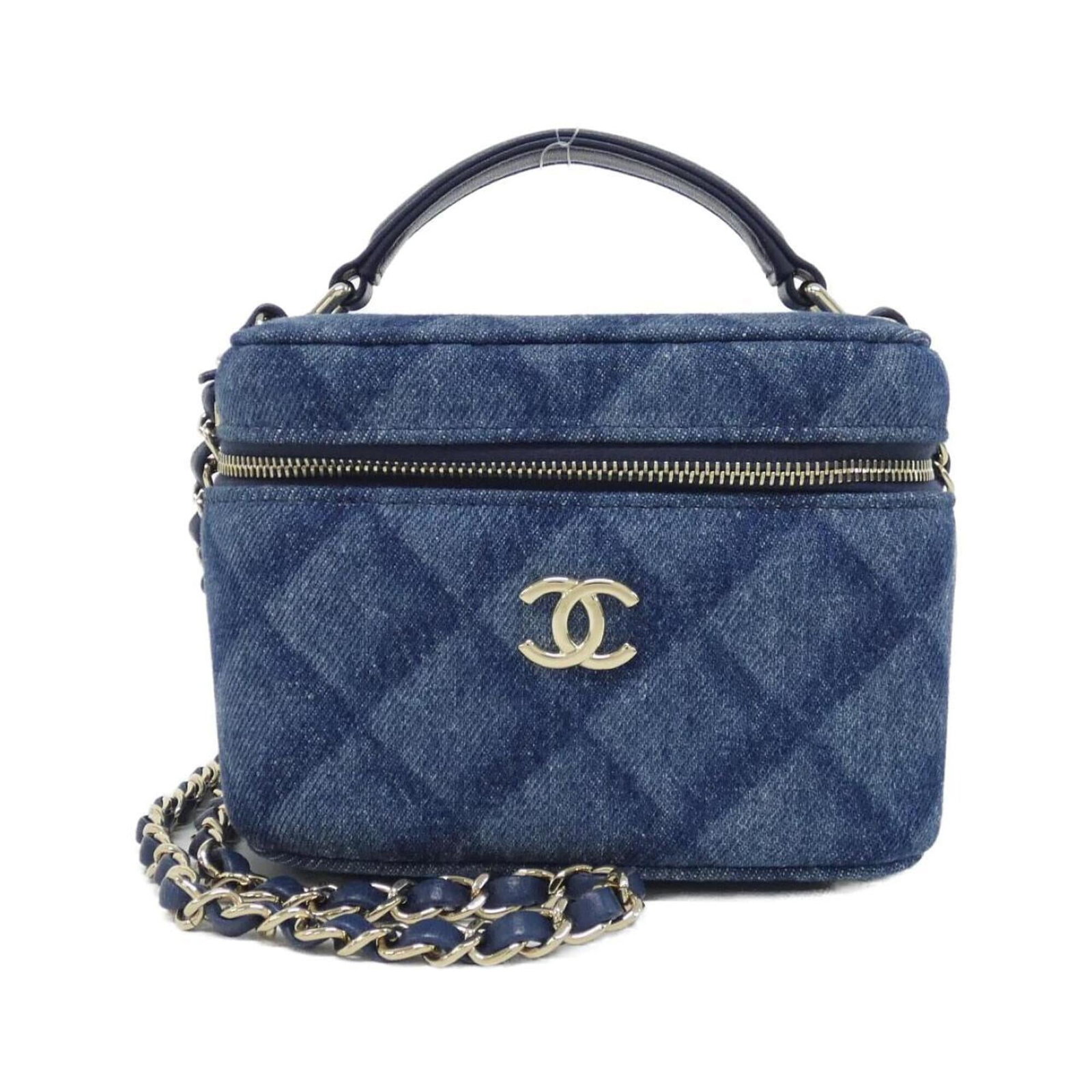 Handbag denim by Chanel: Handbag denim by Chanel Chanel's iconic denim handbag, featuring a timeless blue hue and gold hardware, adds a touch of effortless chic to any outfit. With its compact size and durable construction, t