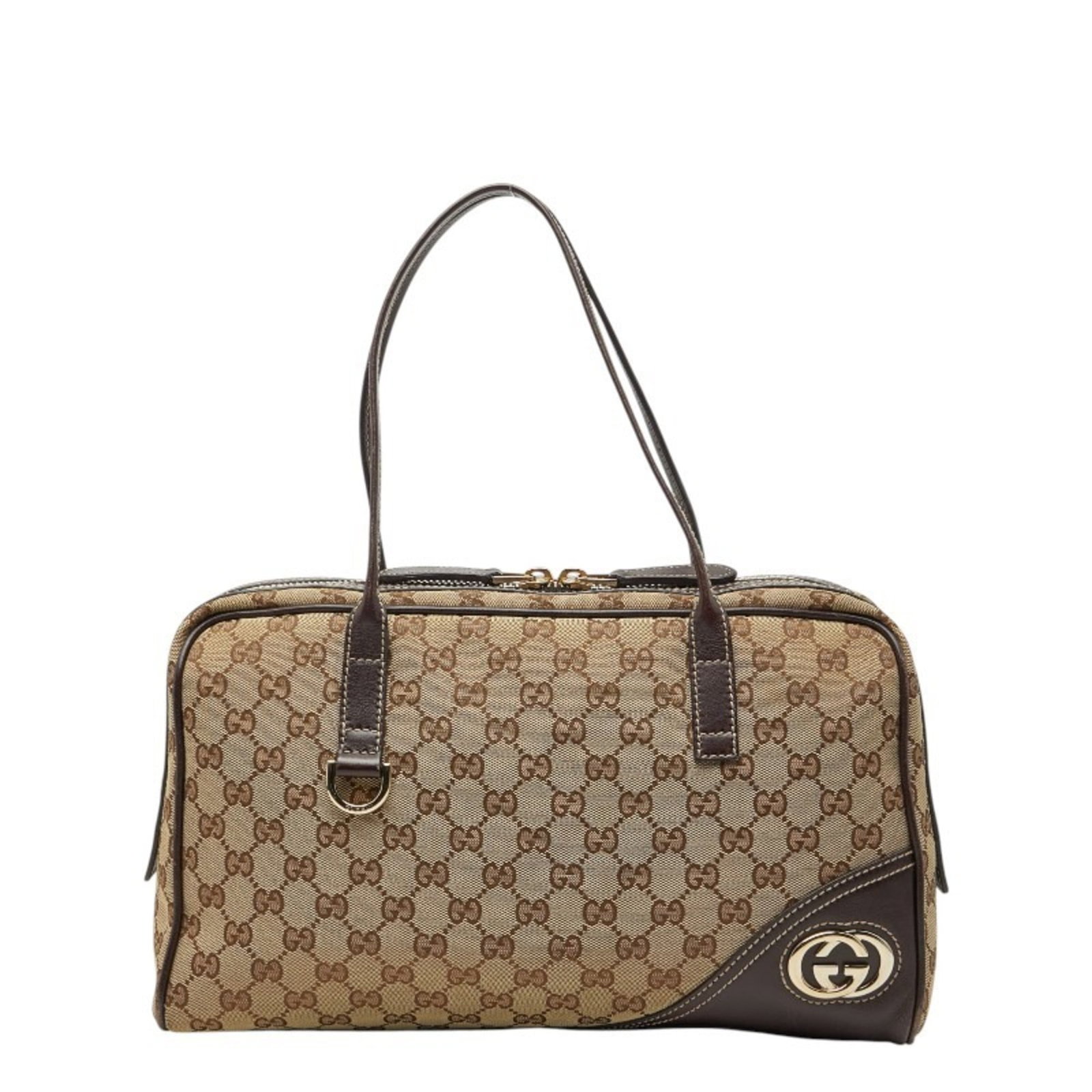 Canvas leather handbag by Gucci: Canvas leather handbag by Gucci Canvas leather handbag by Gucci, featuring a unique blend of Gg Canvas and high-quality leather in beige brown. This stylish bag measures 20cm x 37cm x 5cm and