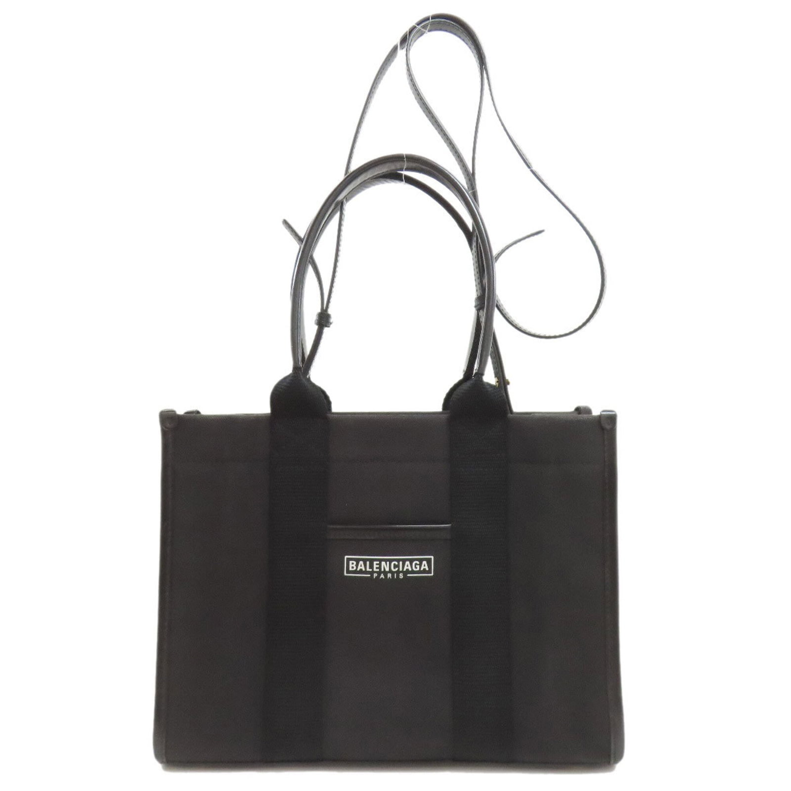 Canvas bag tote by Balenciaga: Canvas bag tote by Balenciaga Canvas bag tote by Balenciaga, featuring a sleek black canvas design with a few traces of usage and minor scratches. The bag measures 21cm x 28cm x 11cm and is in very