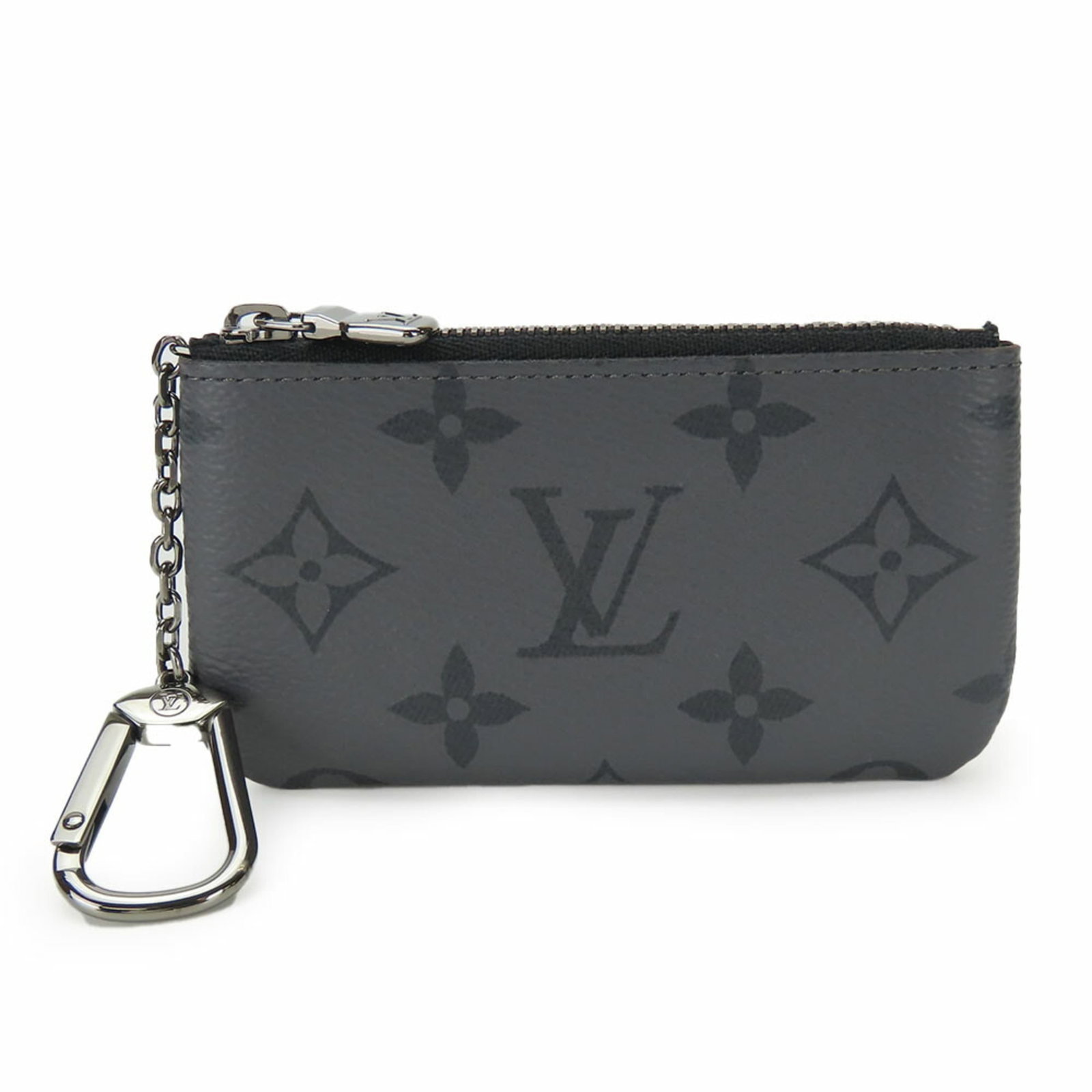 Louis Vuitton Coin Purse/ Coin Case Monogram Eclipse: Louis Vuitton Coin Purse/ Coin Case Monogram Eclipse Monogram Eclipse coin purse from Louis Vuitton, featuring the iconic monogram pattern in black and gray. With its sleek design and zipper closure,