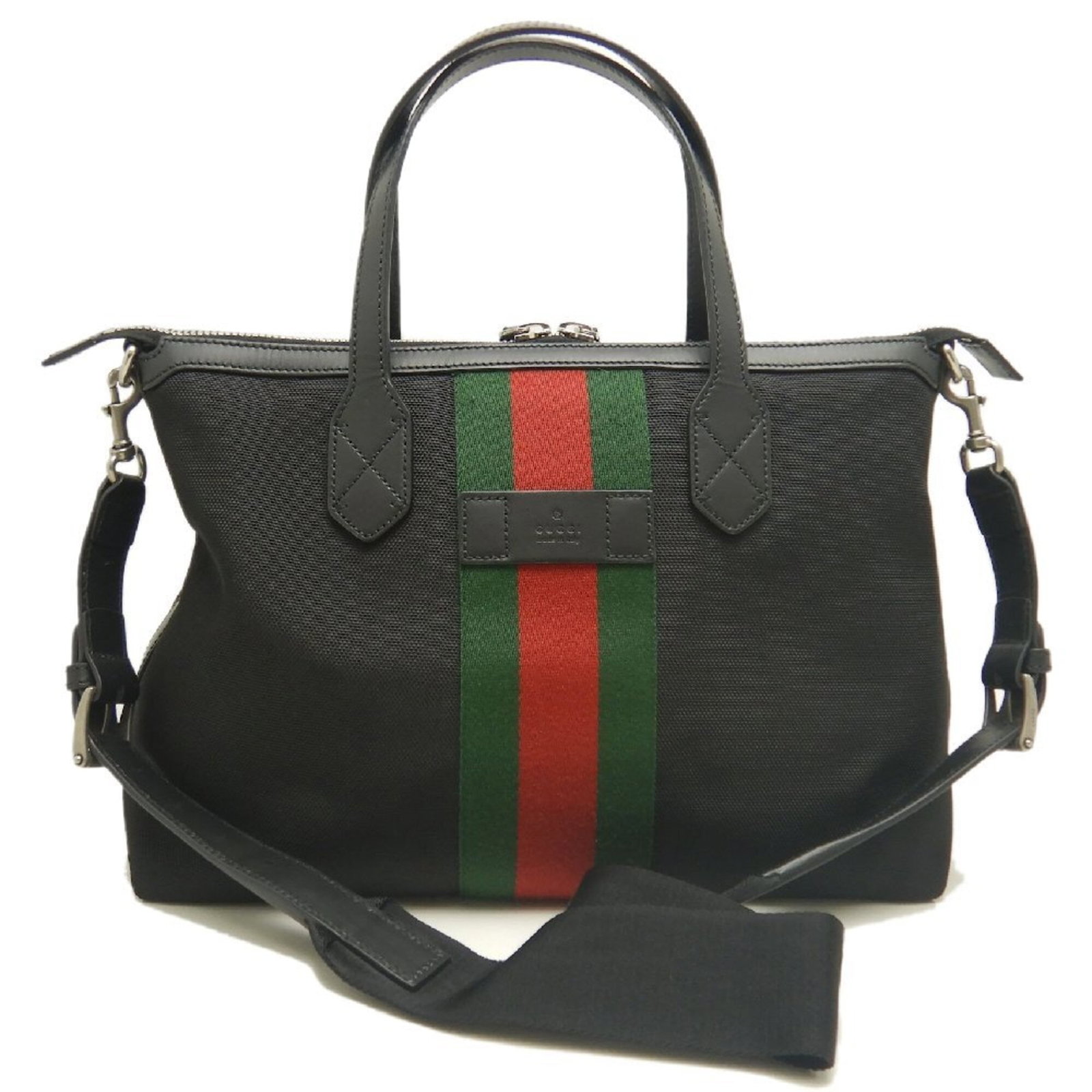Canvas Leather Bag Gucci Tote: Canvas Leather Bag Gucci Tote Canvas Leather Bag Gucci Tote - A timeless and sophisticated accessory, this black canvas leather tote features silver hardware and a sturdy zipper closure. Measuring