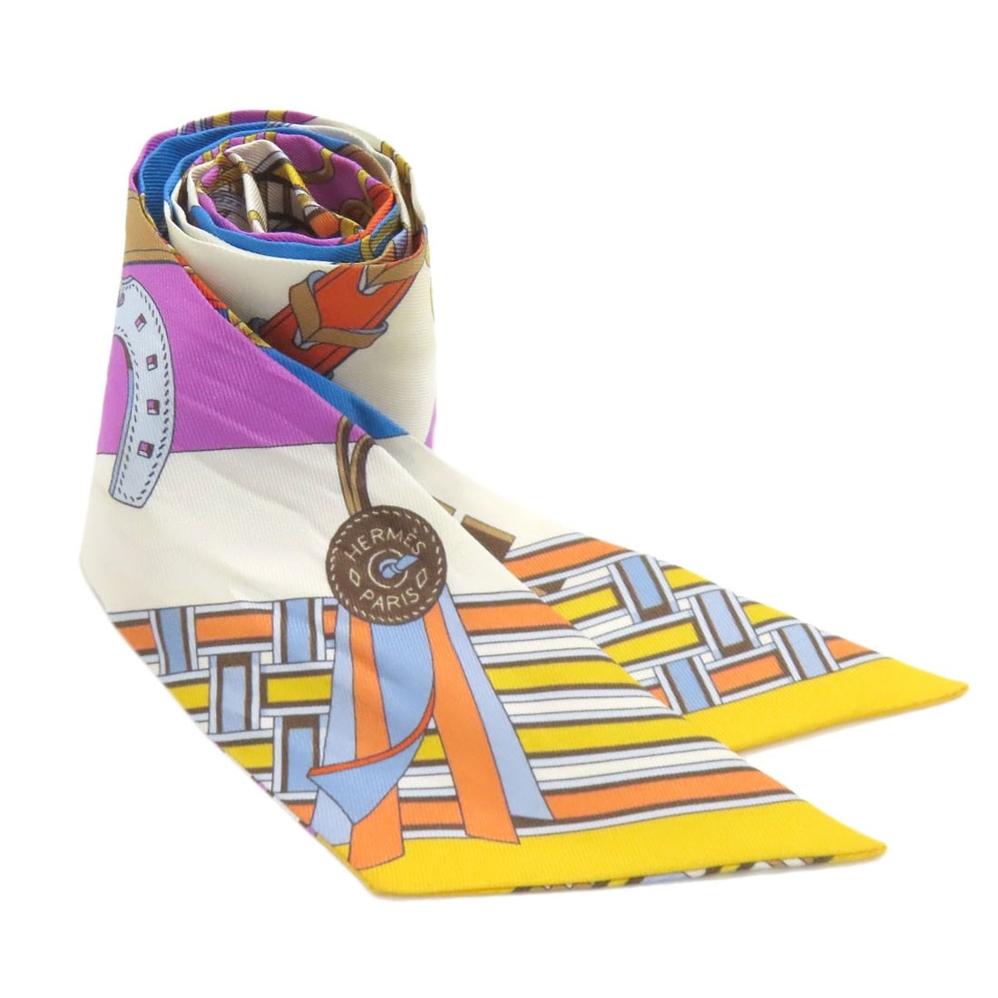 Hermes Twilly Scarf Silk: Hermes Twilly Scarf Silk Silk Twilly Scarf from the renowned French fashion house Hermes, boasting a vibrant multicolor design. Made from high-quality silk, this scarf is a true representation of Herm