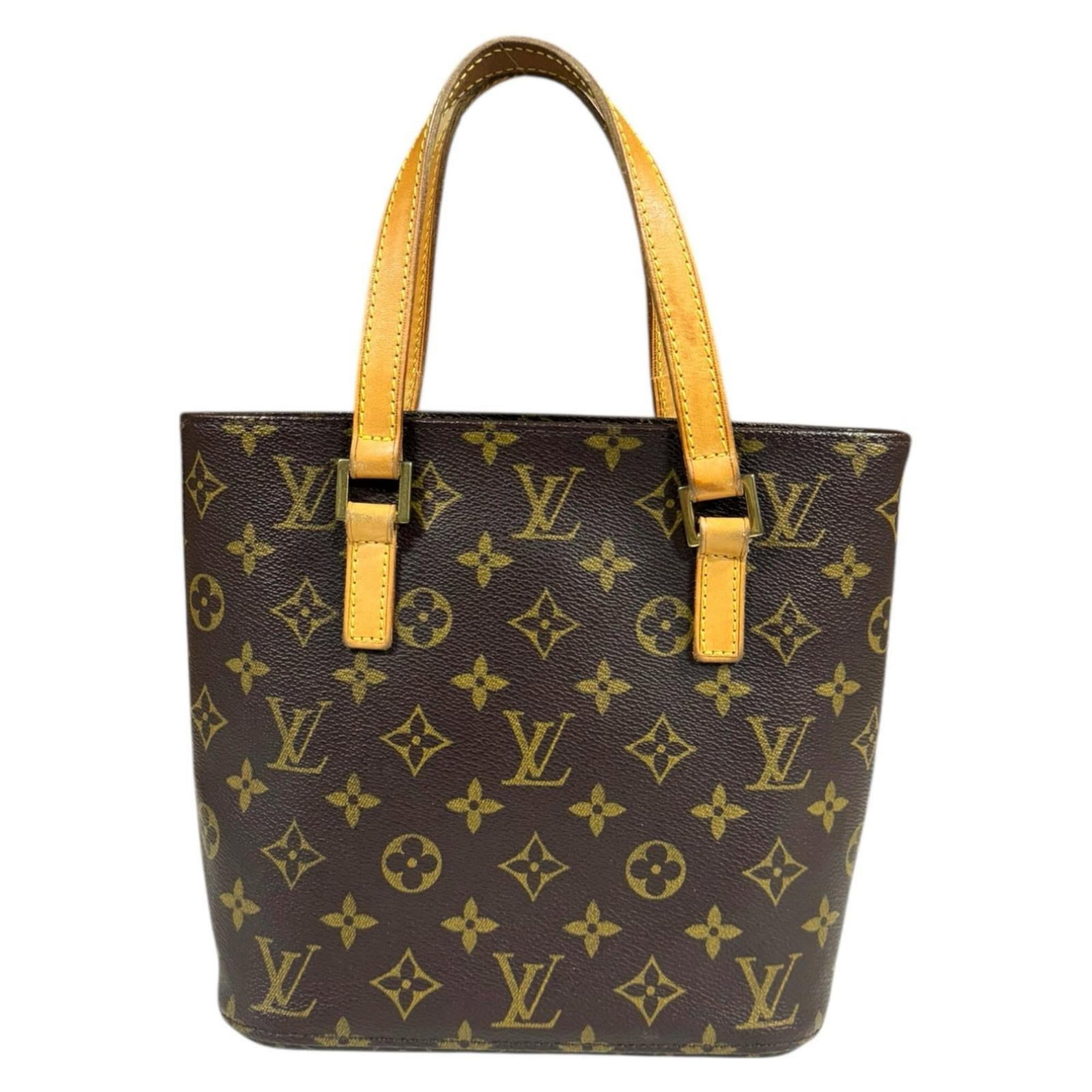 Louis Vuitton Handbag Monogram: Louis Vuitton Handbag Monogram This Louis Vuitton Handbag Monogram in brown features the iconic monogram pattern, showcasing the brand's signature style. With its classic design and timeless appeal,
