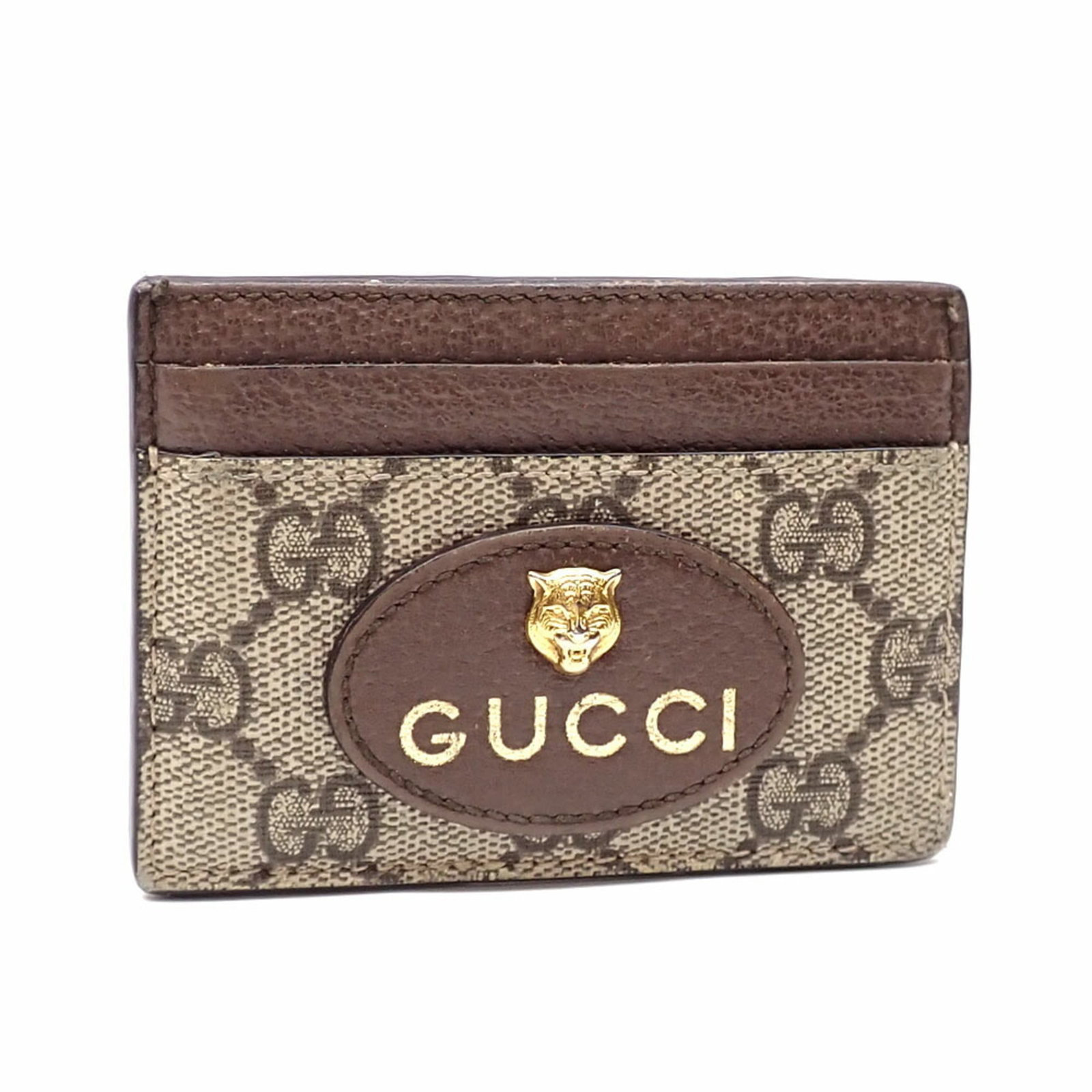 Case card Gucci: Case card Gucci Used Gucci card case in beige, featuring traces of usage and minor scratches. The card case has been worn and shows signs of wear, but remains generally in good condition. Item Specifi