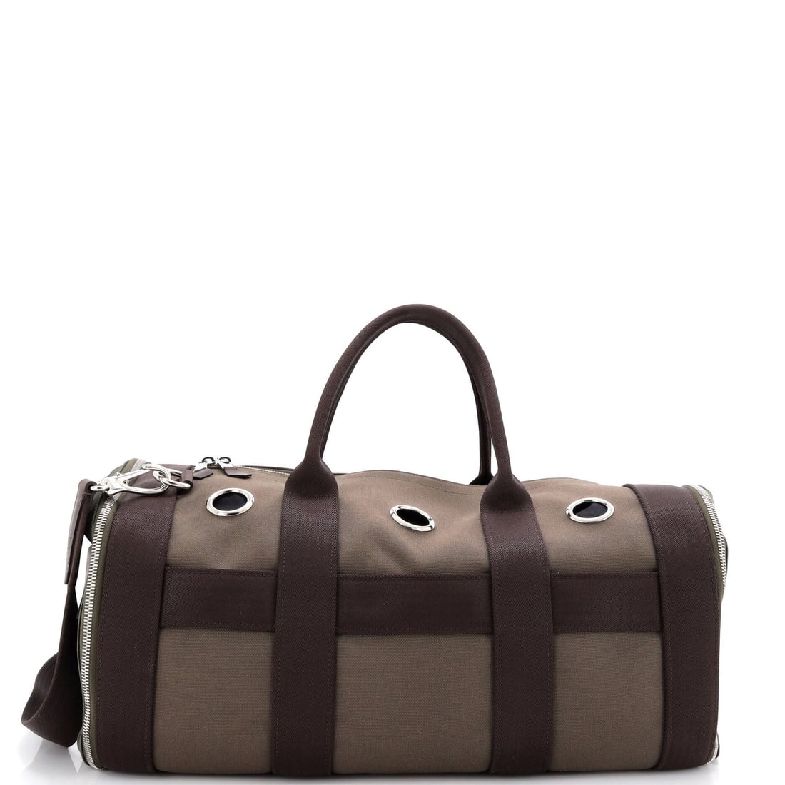 Dog Carrying Bag Canvas by Hermes: Dog Carrying Bag Canvas by Hermes Canvas dog carrying bag by Hermes features a vibrant green exterior with an orange interior, complete with palladium hardware. The sturdy canvas material and