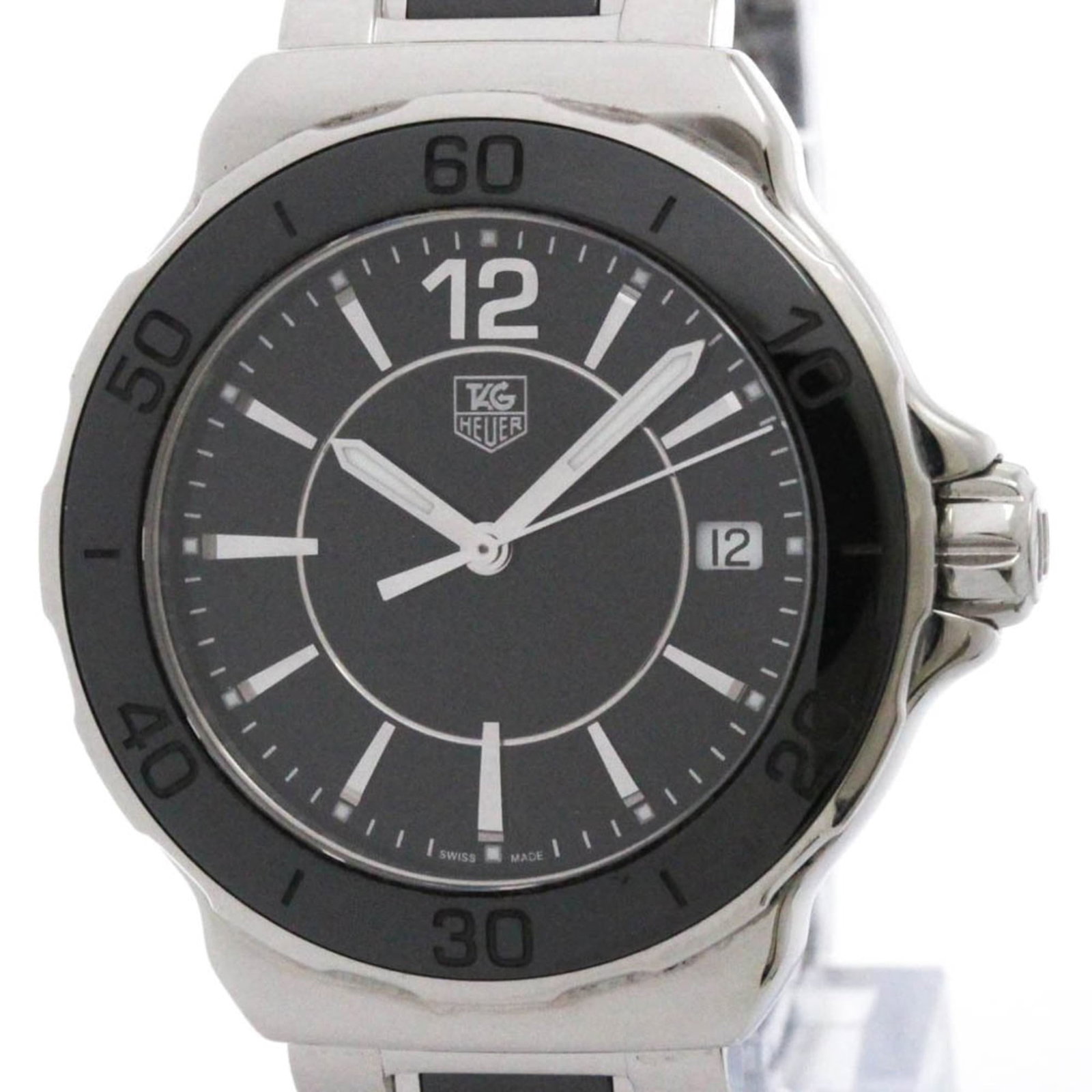 Wristwatch by Tag Heuer: Wristwatch by Tag Heuer Ceramic and stainless steel make up the sleek, sporty design of this Tag Heuer wristwatch. The black band adds a touch of sophistication to its 34mm case diameter, while minor