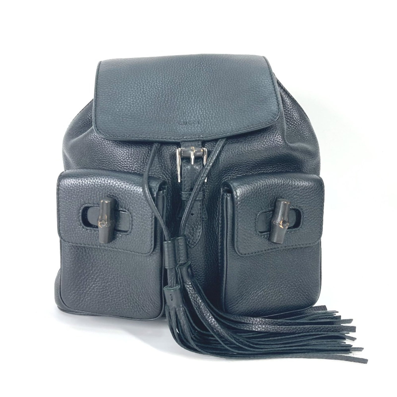 Backpack Leather Gucci: Backpack Leather Gucci Black leather backpack from Gucci, measuring 29.5cm wide and 26.5cm tall with a 9cm depth. The item features a classic design with some minor scratches and dirt visible due to