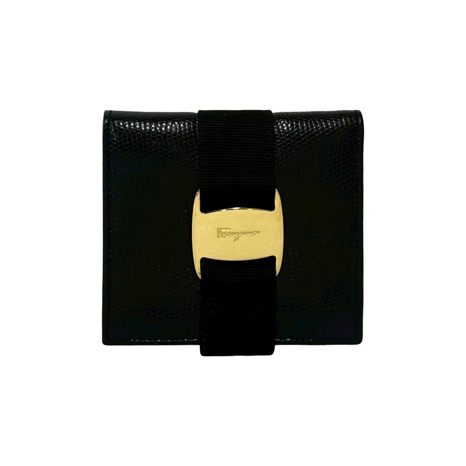 Salvatore Ferragamo Wallet (Bi-Fold) Leather: Salvatore Ferragamo Wallet (Bi-Fold) Leather Used Salvatore Ferragamo Bi-Fold Leather Wallet in Black. This classic wallet features high-quality leather construction and a timeless design, with