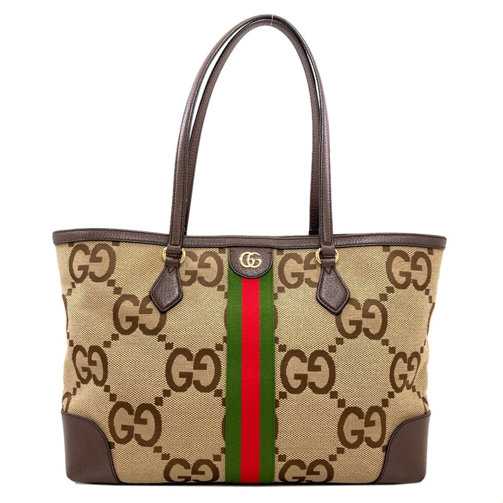 Canvas Gucci Tote: Canvas Gucci Tote Canvas Gucci Tote in Beige and Brown, featuring a classic tote design with a canvas material. Measuring 28.5cm x 44cm x 14cm, it has been used but remains in good condition, showing 