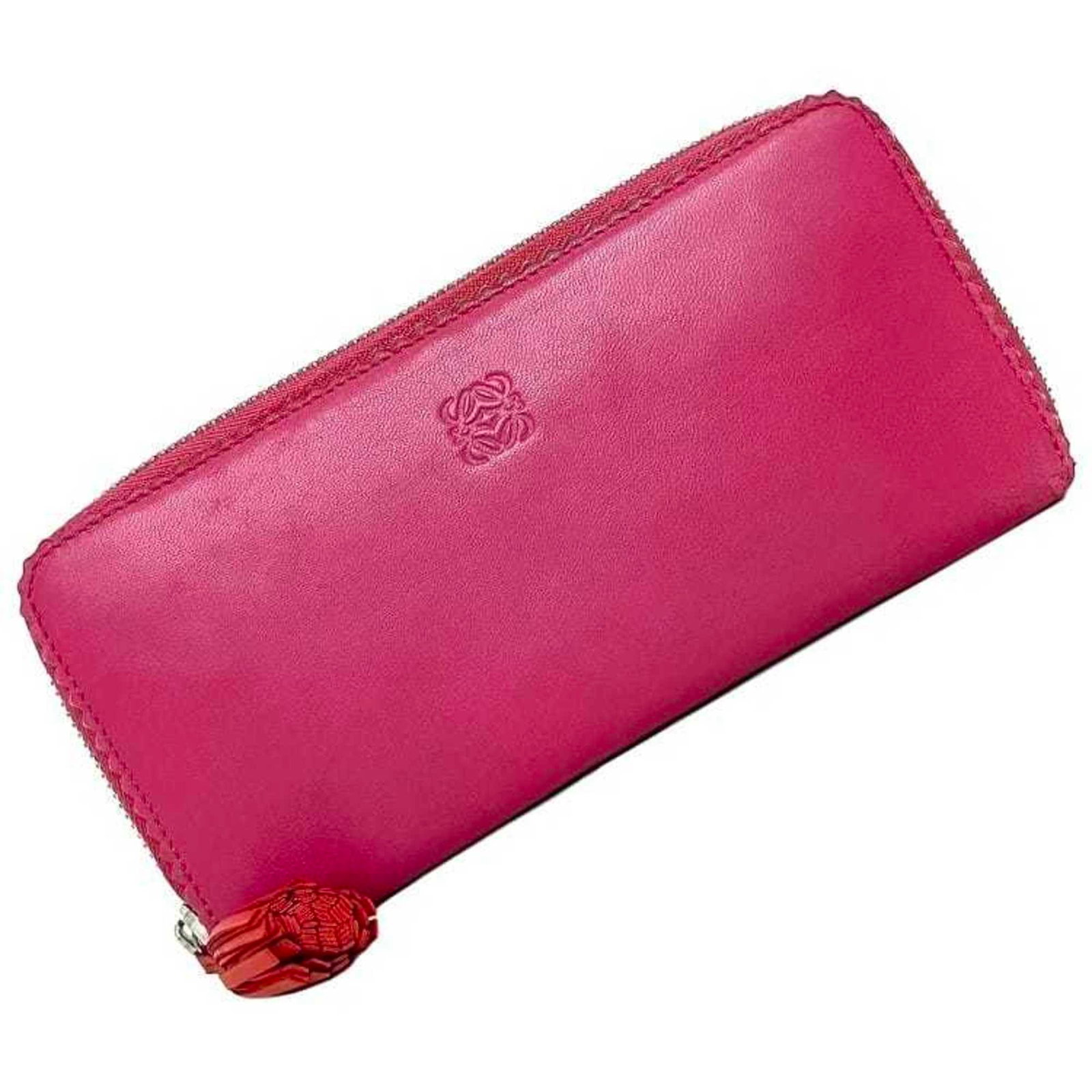 Loewe Long Wallet (Bi-Fold) Nappa Leather: Loewe Long Wallet (Bi-Fold) Nappa Leather Pink Loewe Long Wallet (Bi-Fold) Nappa Leather features a classic bi-fold design and premium nappa leather construction. With its signature style and