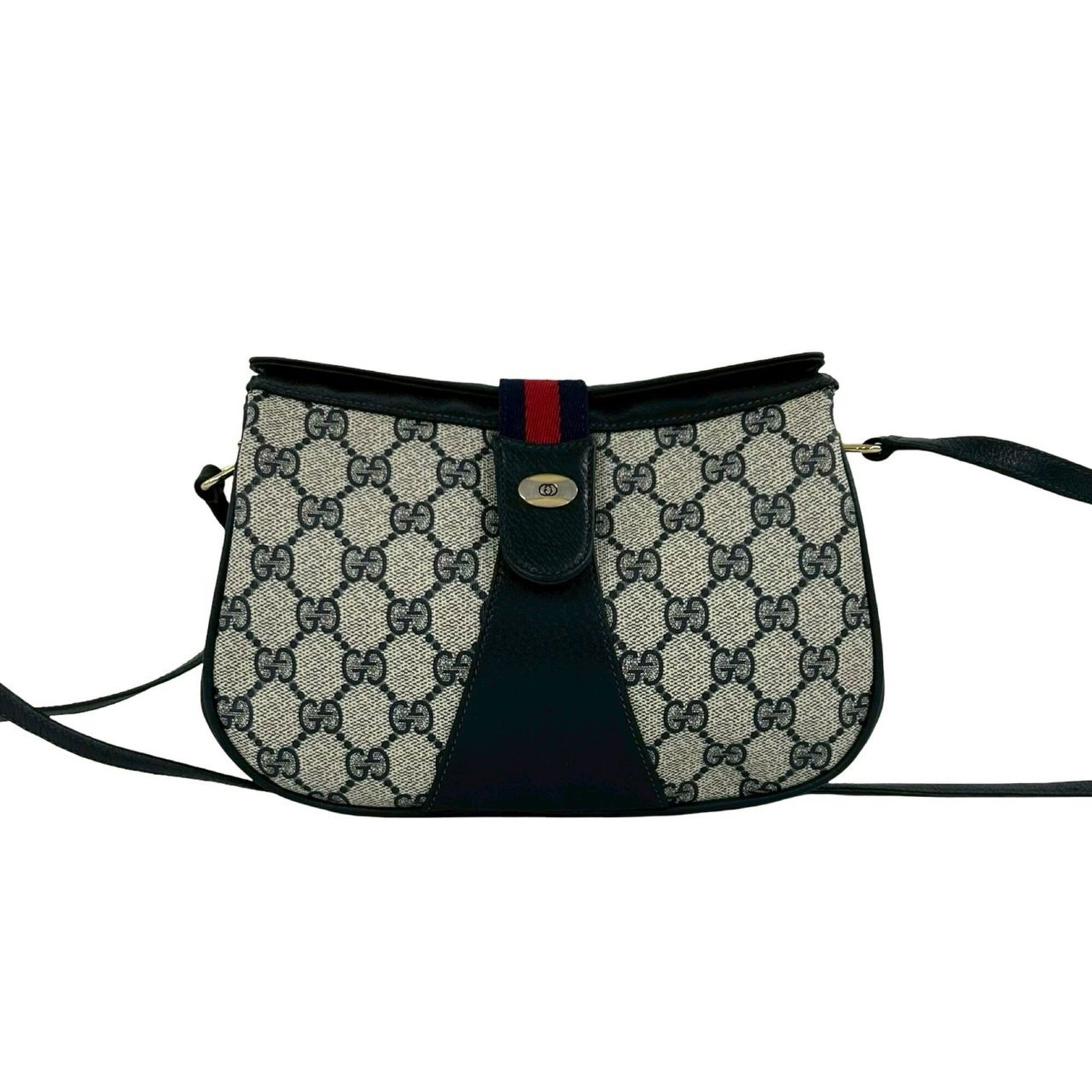 PVC leather shoulder bag by Gucci: PVC leather shoulder bag by Gucci PVC leather shoulder bag by Gucci, featuring a striking navy and red color combination. This used item showcases some traces of usage, with minor scratches and dirt