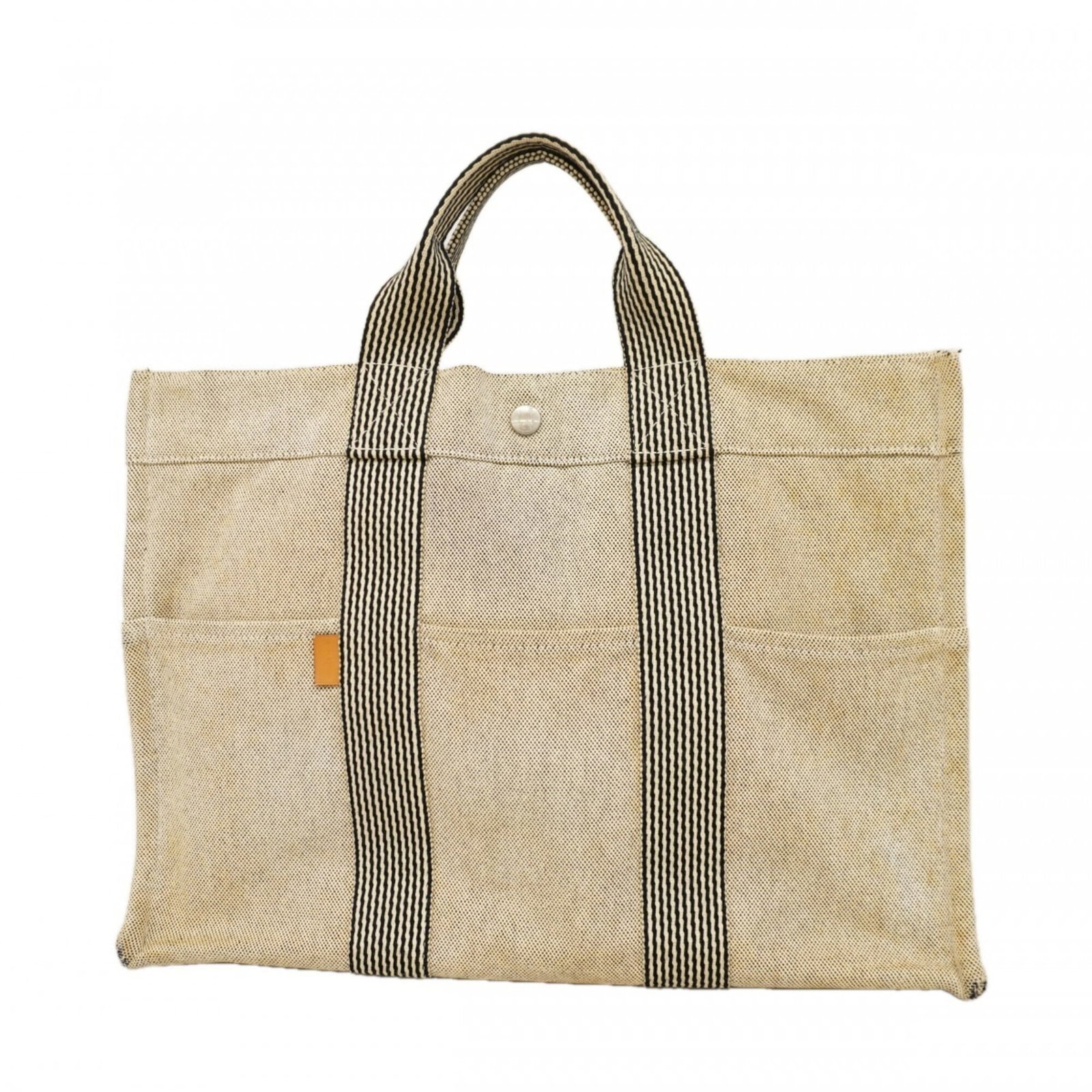 Canvas tote bag by Hermes: Canvas tote bag by Hermes Canvas tote bag by Hermes, featuring a timeless gray color and sleek silver hardware. This versatile canvas tote measures 30.5cm x 42cm x 10cm, offering ample space for