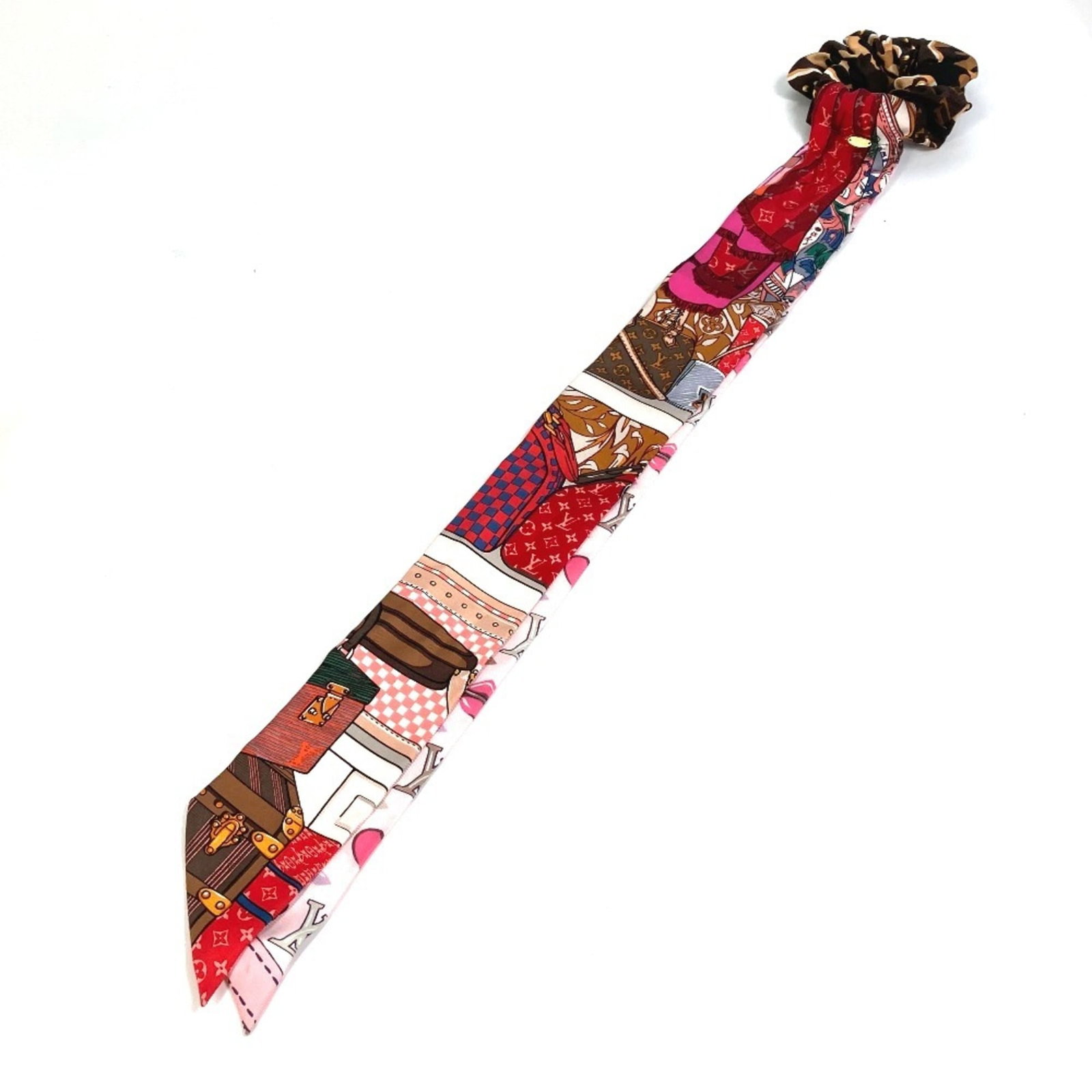 Vuitton silk scrunchie from Louis: Vuitton silk scrunchie from Louis Silk scrunchie from Louis Vuitton, featuring multi-color design. Made from high-quality silk material with a size of 65cm x 25.59''. Opened and never used. Item