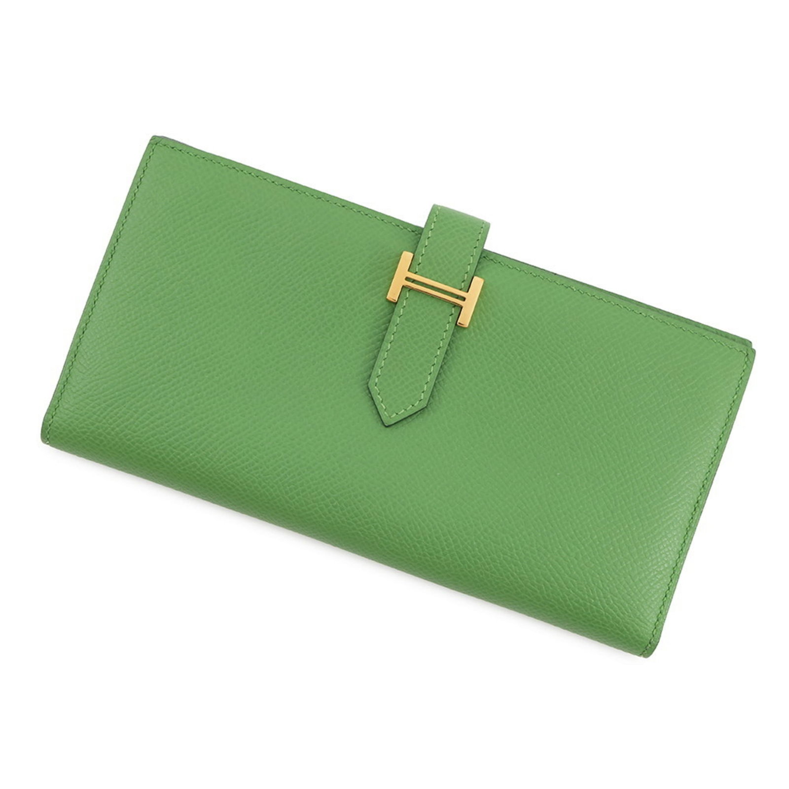 Epsom long bi-fold leather wallet from Hermes: Epsom long bi-fold leather wallet from Hermes Epsom long bi-fold leather wallet from Hermes features high-quality Epsom leather, carefully crafted into a sleek and sophisticated design. Measuring 9cm 