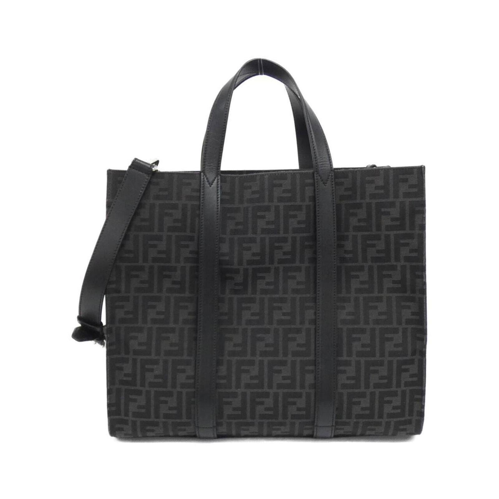 Canvas leather handbag by Fendi: Canvas leather handbag by Fendi Canvas leather handbag by Fendi, featuring high-quality calfskin leather and sleek silver hardware. Made from durable canvas with a sturdy leather exterior, this versat