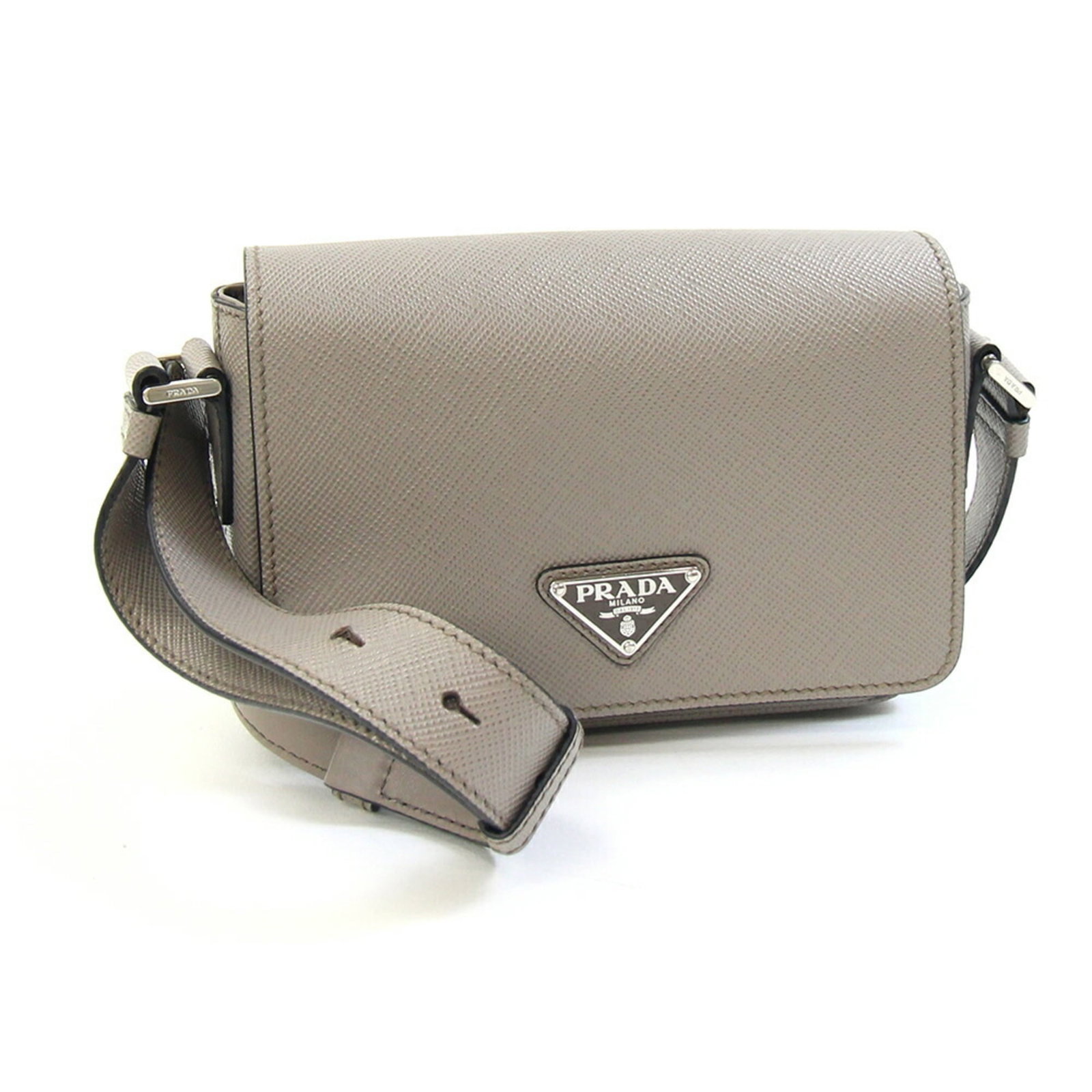 Shoulder Bag Saffiano Prada: Shoulder Bag Saffiano Prada Saffiano Prada shoulder bag in grayish color, featuring durable Saffiano material and adjustable strap length. The bag has some traces of usage with minor scratches and dir