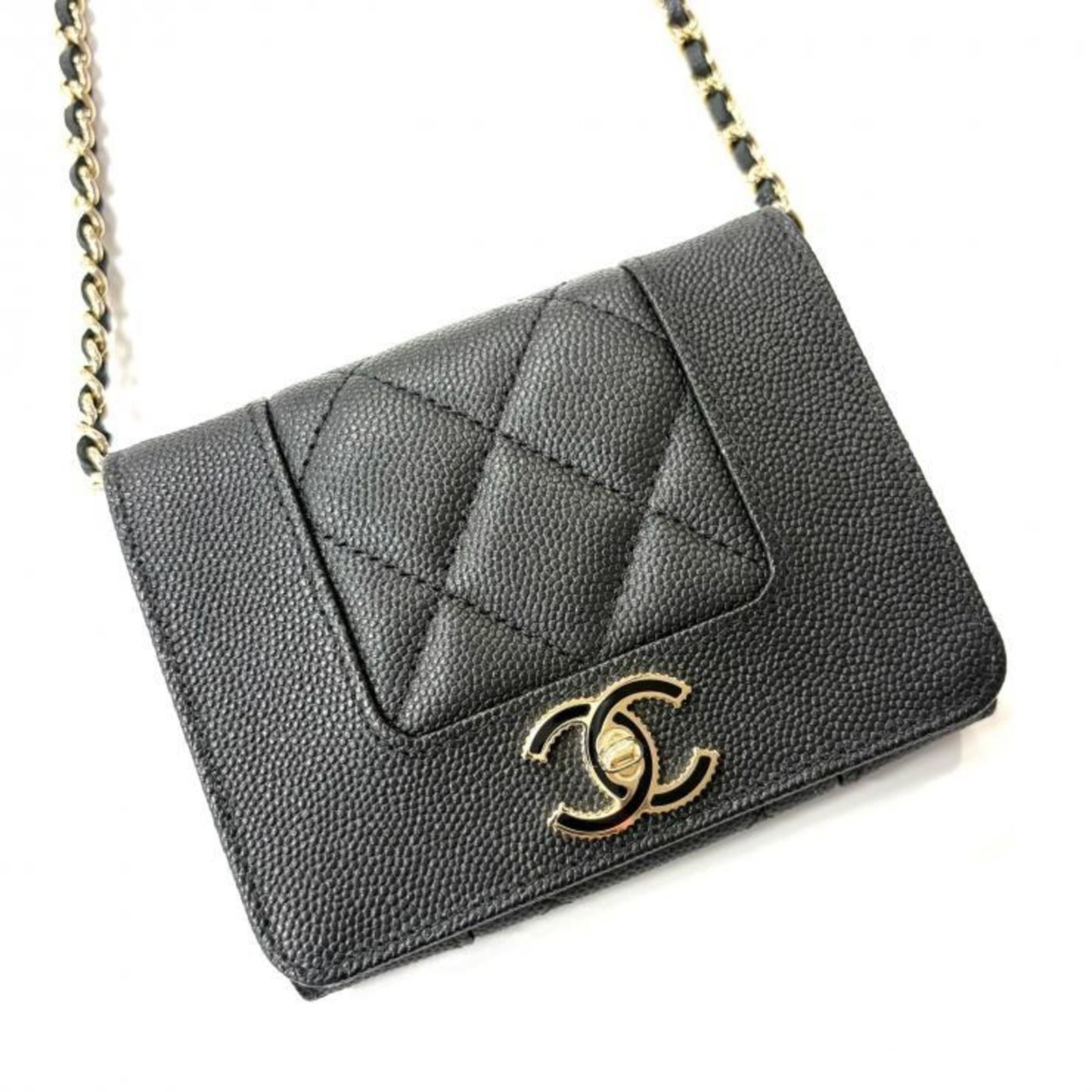 Chanel Chain/ Shoulder Wallet Canvas: Chanel Chain/ Shoulder Wallet Canvas Canvas chain/shoulder wallet from Chanel, featuring a classic design with black canvas material and a compact size. The item has been used and shows signs of
