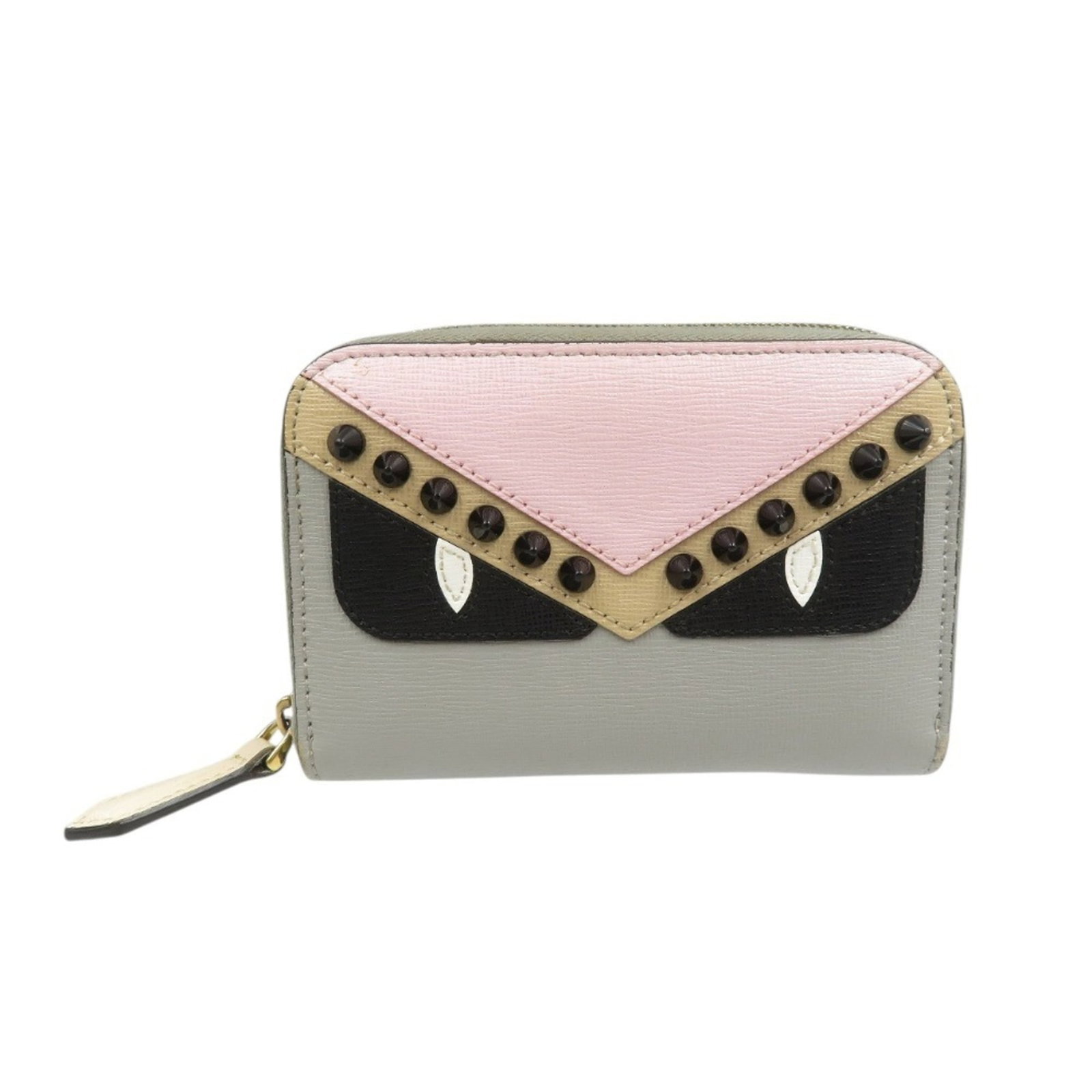 Fendi coin purse leather case: Fendi coin purse leather case Fendi's iconic coin purse leather case boasts a timeless design in beige pink and gray beige hues, crafted from high-quality calfskin. With its compact size and elegant
