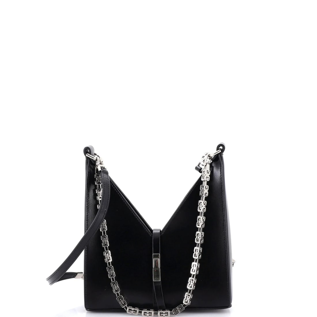 Cut out leather mini bag from Givenchy: Cut out leather mini bag from Givenchy Givenchy's cut out leather mini bag boasts sleek, modern lines and a chic black exterior. The bag's interior features matching black leather and silver