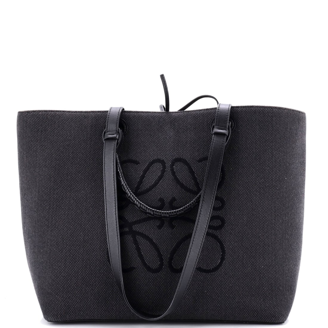 Square basket tote medium canvas loewe anagram: Square basket tote medium canvas loewe anagram Black canvas medium Loewe Anagram Square Basket Tote with leather interior, featuring scuffs and edge wear on the exterior. The tote measures 11" handle