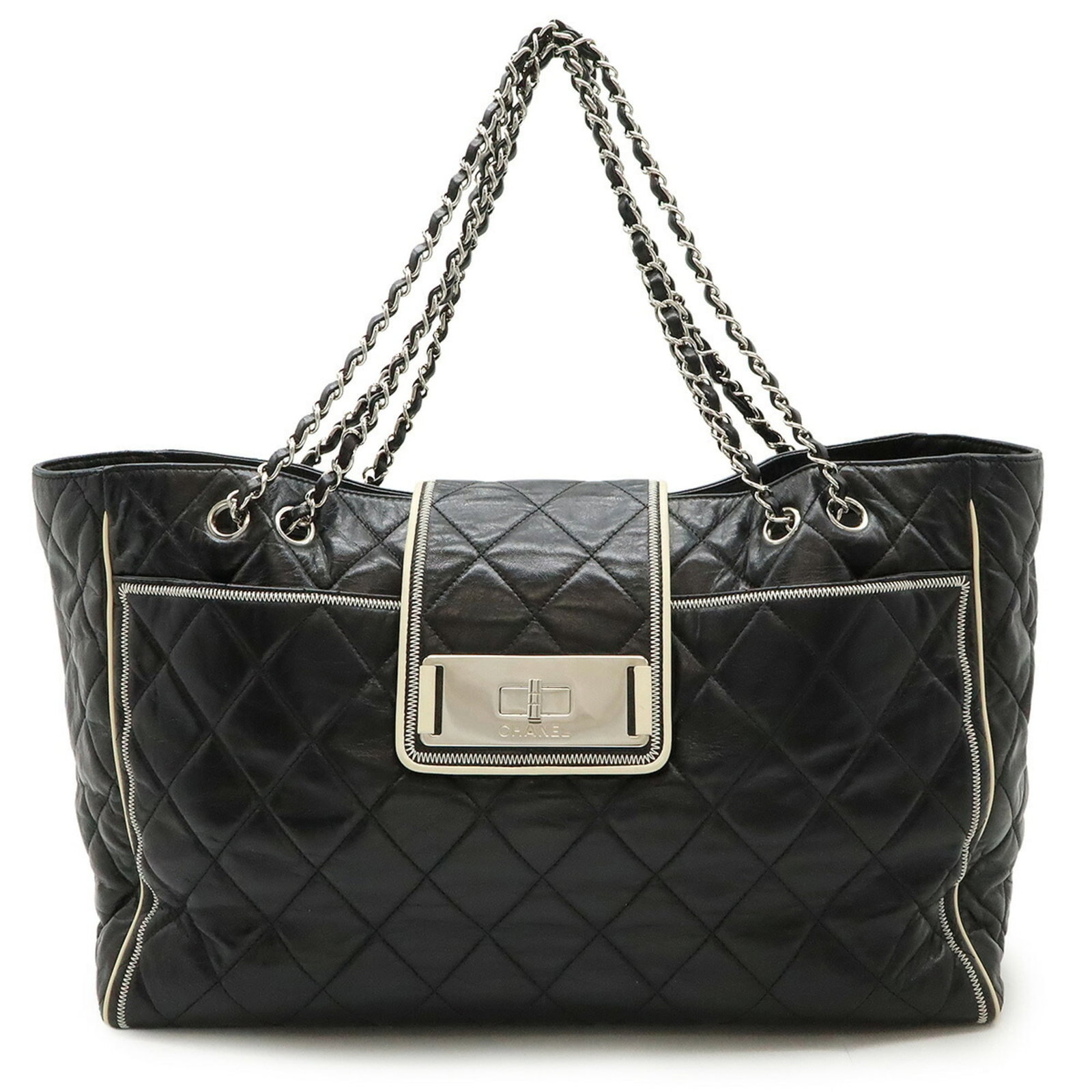 Tote Bag Leather from Chanel: Tote Bag Leather from Chanel Black and White Chanel Tote Bag with Calfskin Leather. This pre-owned tote bag features classic Chanel design with black and white calfskin leather construction, measuring
