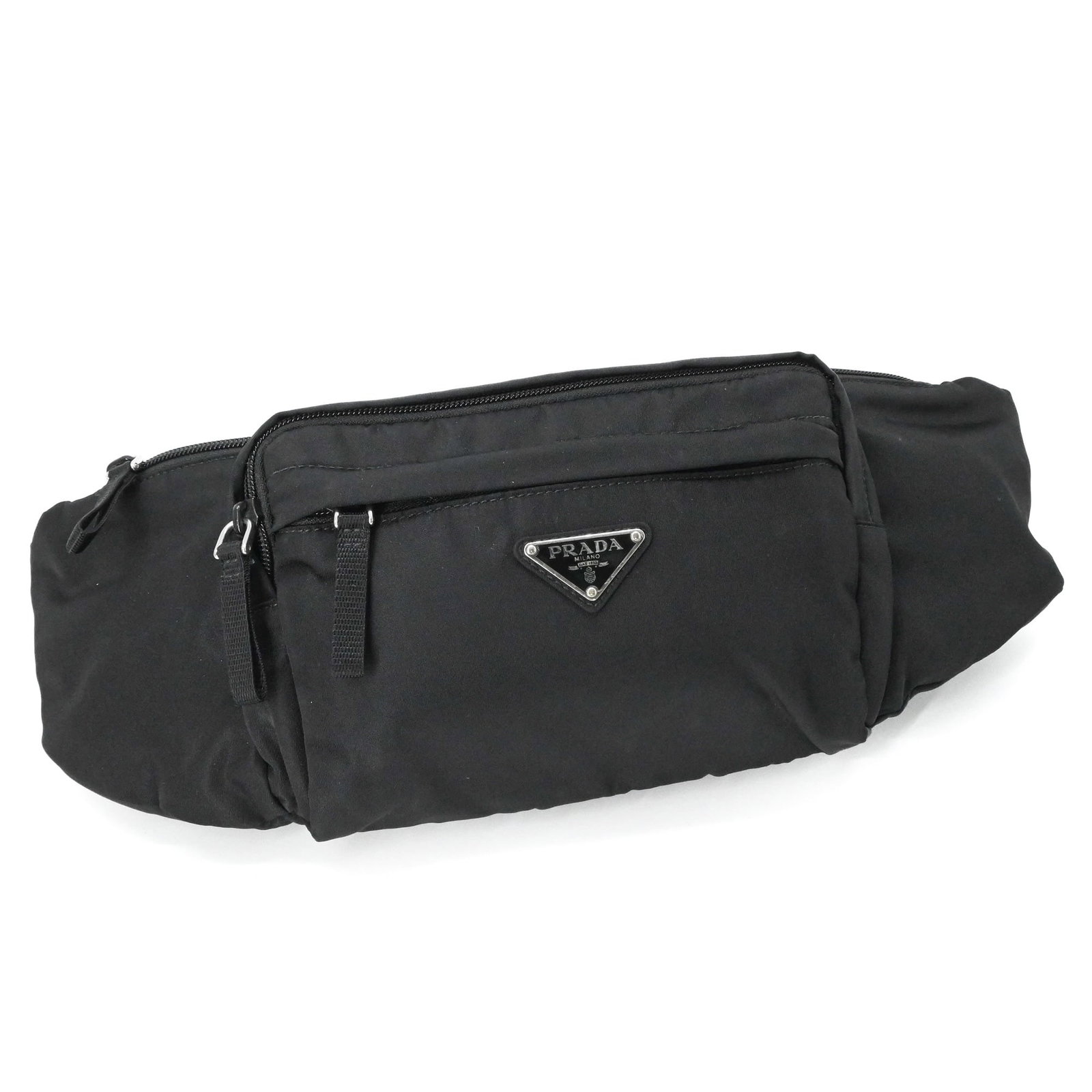 Nylon Prada Sling Bag Fanny Pack: Nylon Prada Sling Bag Fanny Pack Black nylon Prada sling bag fanny pack in very good condition, with some traces of usage and minor scratches / dirt. The bag measures 16cm x 40cm and features a