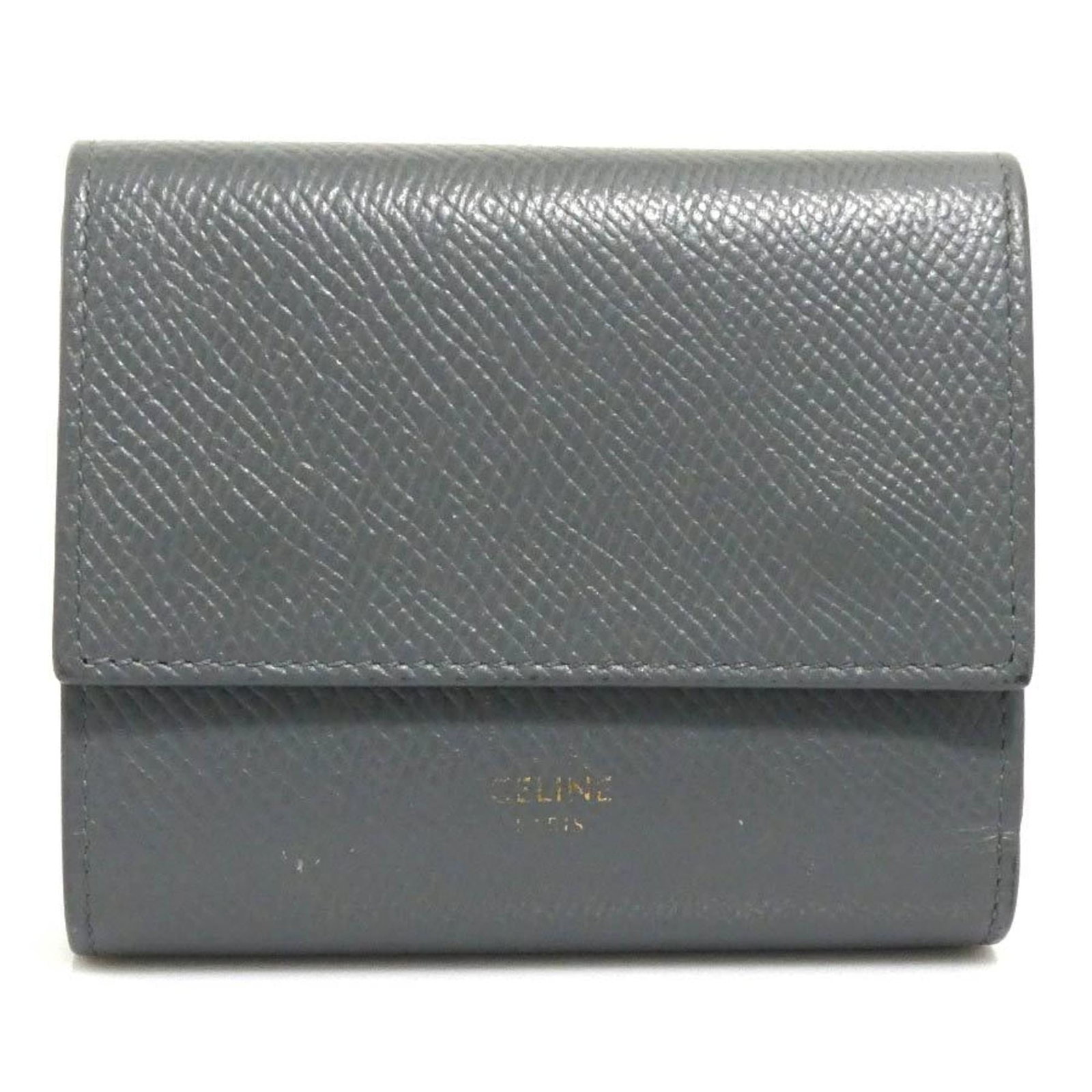 Celine Tri Fold Leather: Celine Tri Fold Leather The Celine Tri Fold Leather wallet boasts a sleek gray finish, measuring 8.2cm x 10.3cm x 2.8cm in size. With its classic tri-fold design and high-quality leather material, it