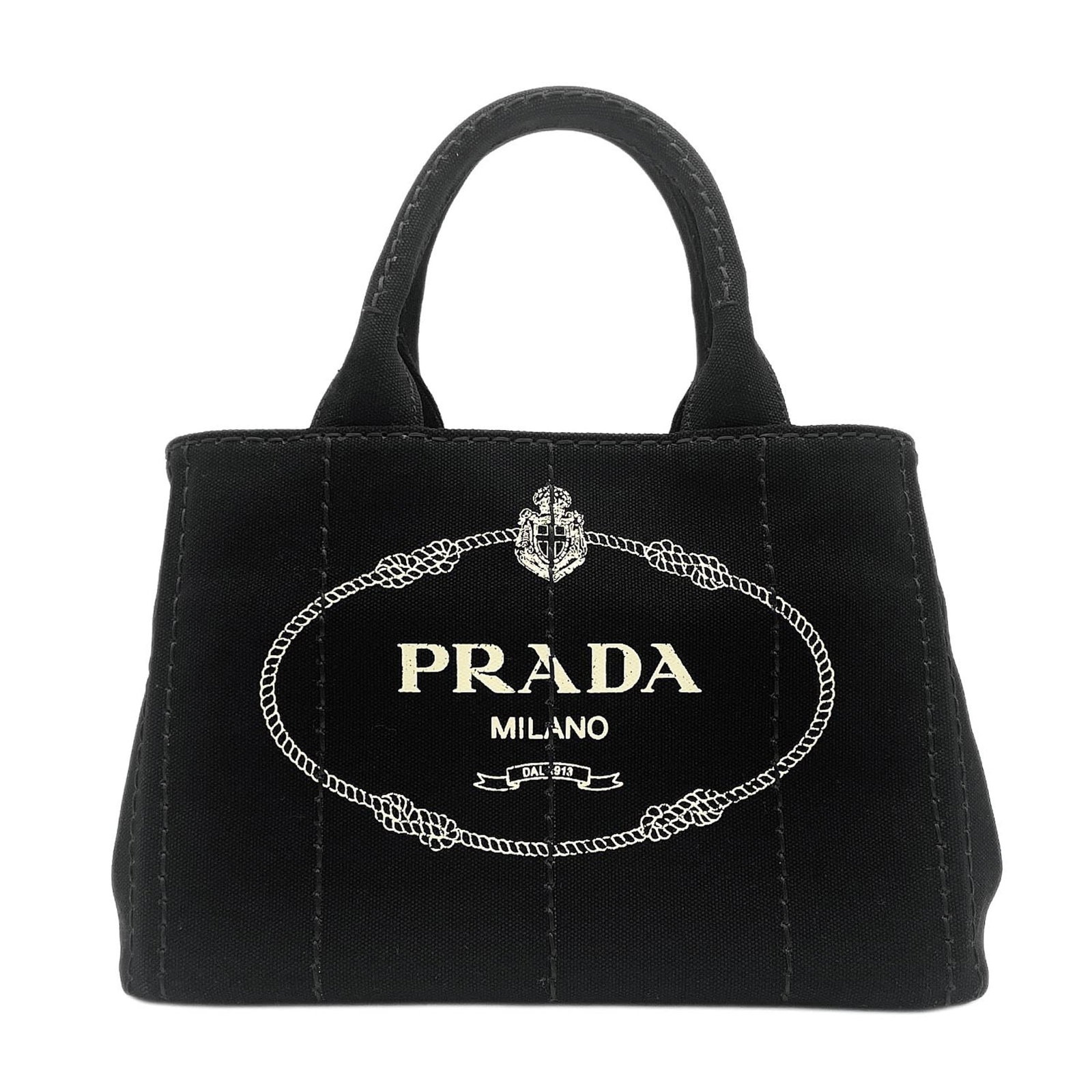 Canvas tote bag: Canvas tote bag Canvas tote bag in black, featuring a durable canvas material and a classic design. This versatile bag measures 19cm x 28cm x 15.5cm and has some minor scratches and dirt from