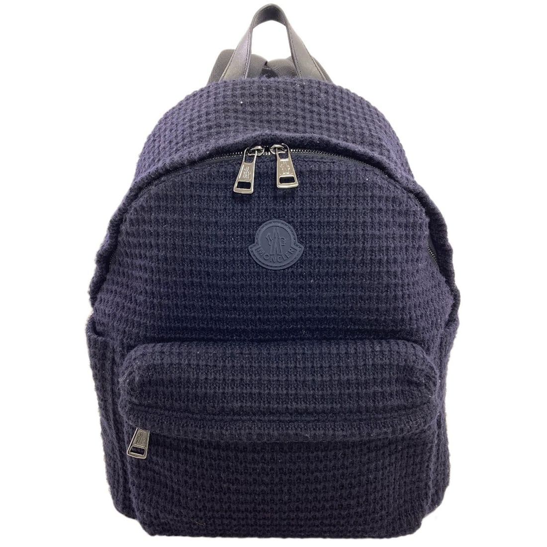 Wool backpack daypack moncler logo: Wool backpack daypack moncler logo Navy wool backpack with the iconic Moncler logo, offering a stylish and durable daypack option. Made from high-quality wool exterior material, this A* style