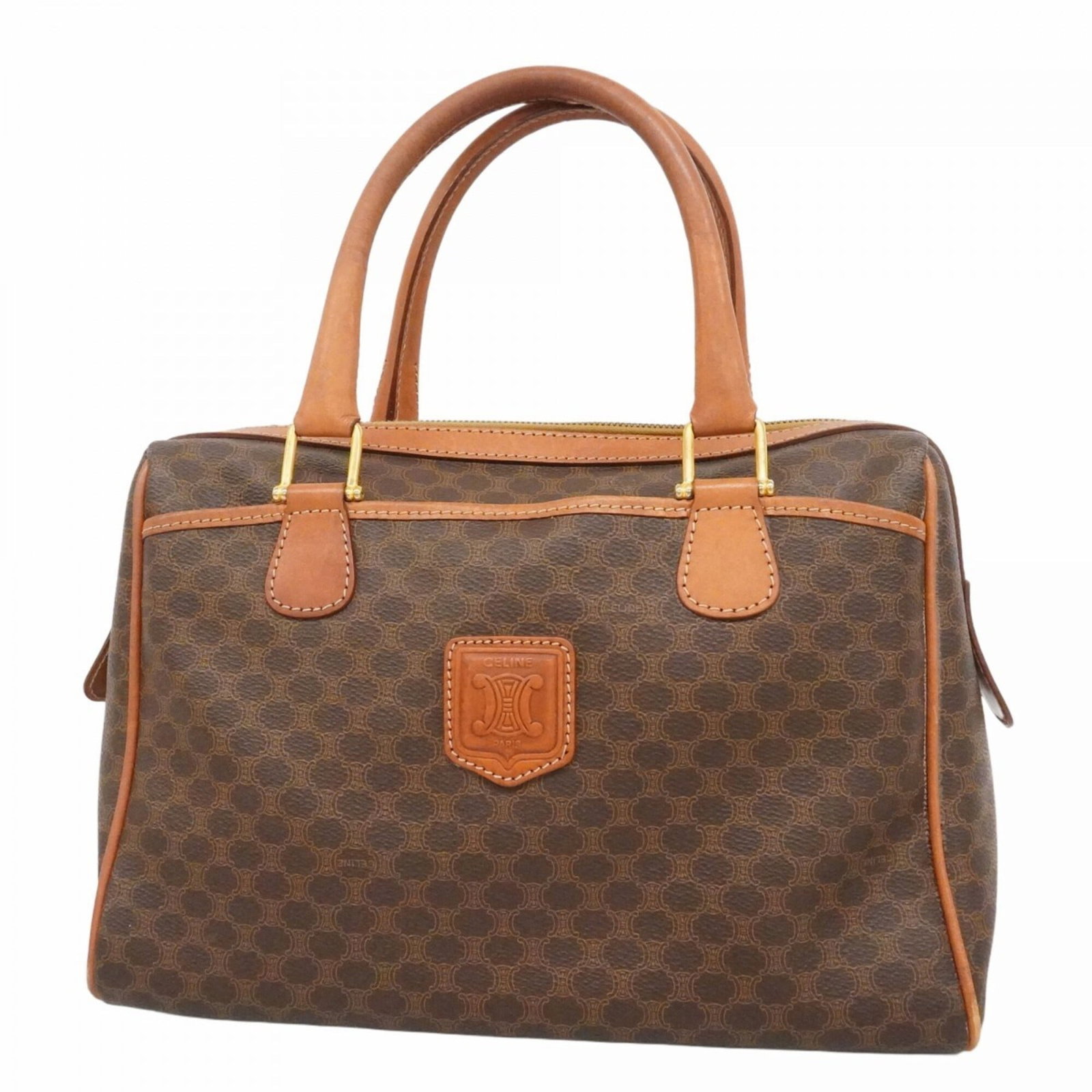 Celine Handbag PVC: Celine Handbag PVC This Celine handbag features a unique PVC material, gold hardware, and a classic brown color. With its distinctive design and sturdy construction, it's a great option for those