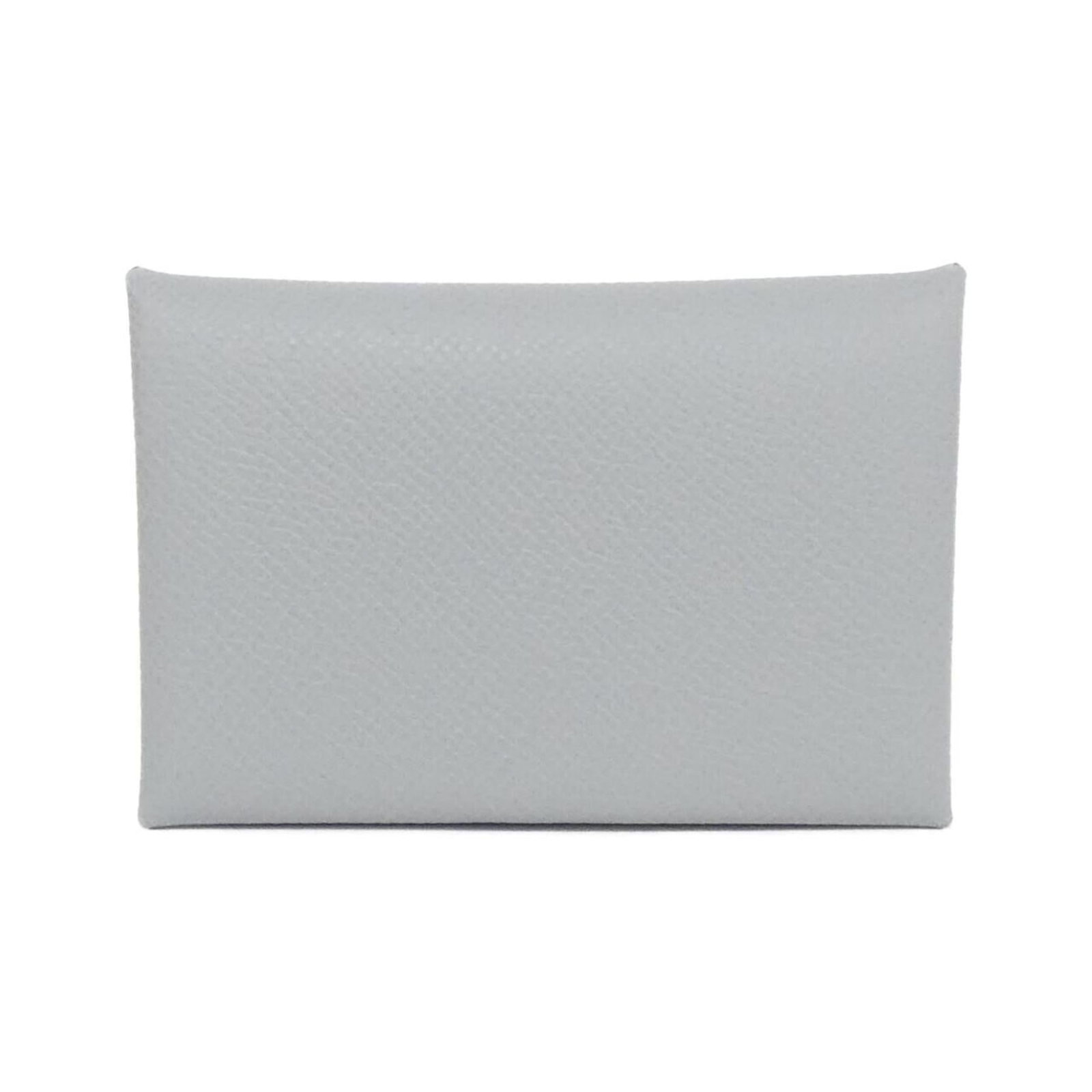 Epsom leather card case from Hermes: Epsom leather card case from Hermes Epsom leather card case from Hermes, featuring a timeless gray color and subtle scratches from previous use. Made from high-quality Epsom leather, this card case