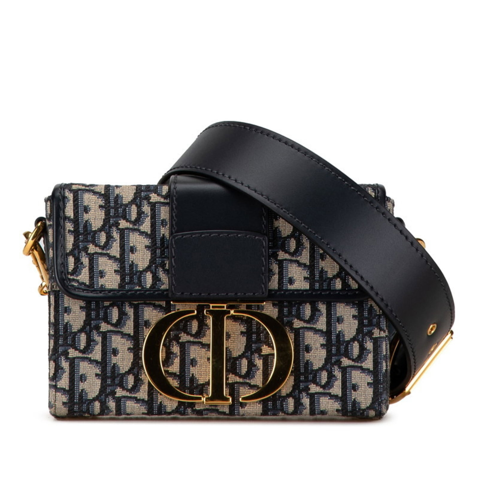 Jacquard leather shoulder bag by Christian Dior: Jacquard leather shoulder bag by Christian Dior Jacquard leather shoulder bag by Christian Dior, featuring a classic design with subtle beige and navy hues. The bag's intricate stitching and premium