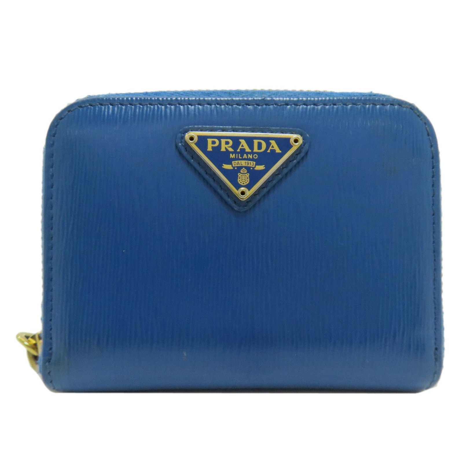Coin purse leather case: Coin purse leather case Blue leather coin purse case with a classic design, bearing traces of usage and minor scratches. Made from high-quality leather, this compact case measures 8cm x 10.5cm x 2cm.