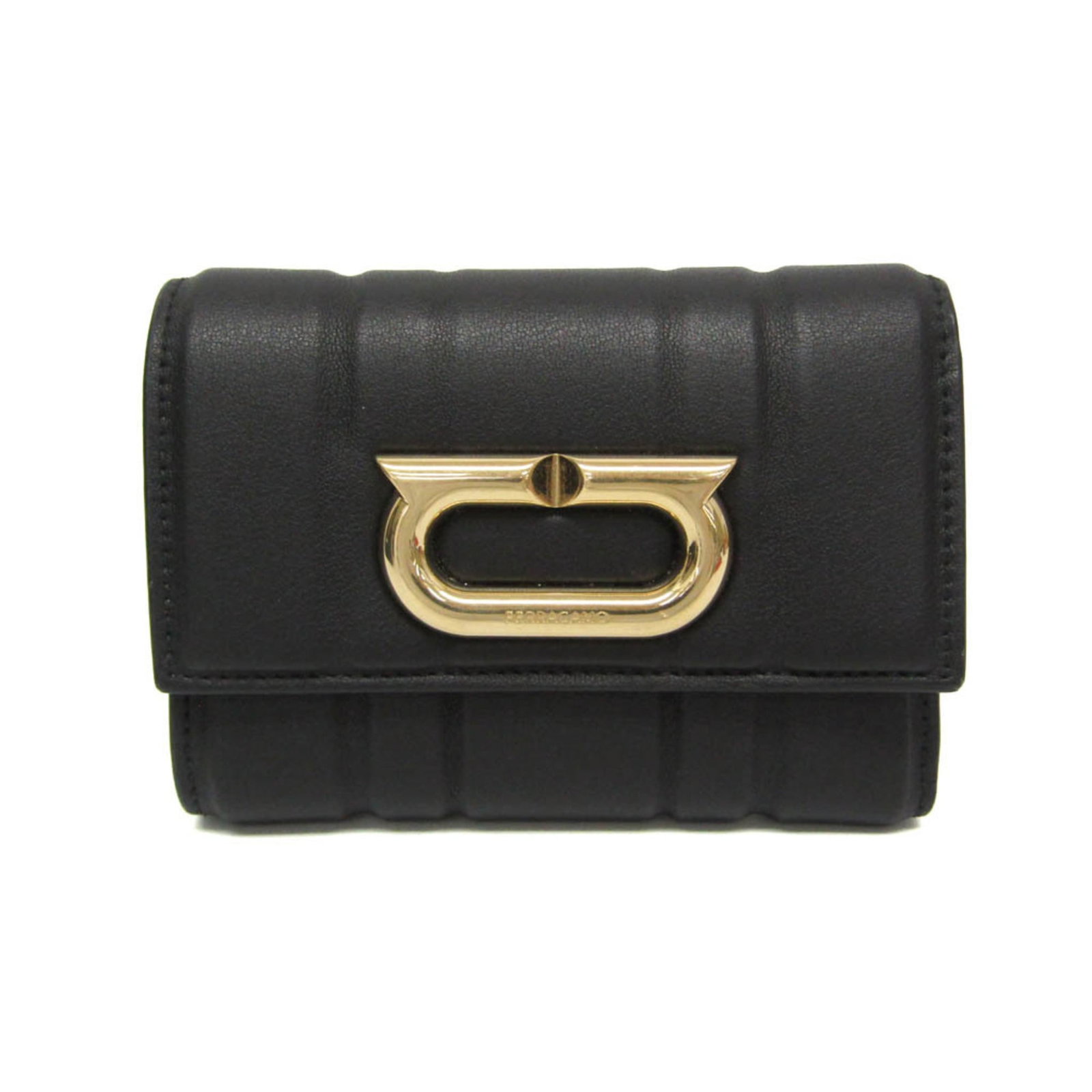 Salvatore Ferragamo Leather Tri Fold Wallet: Salvatore Ferragamo Leather Tri Fold Wallet Black leather tri-fold wallet with snap fastener closure, featuring one coin purse, six card slots, and two inner pockets. Made from high-quality leather,