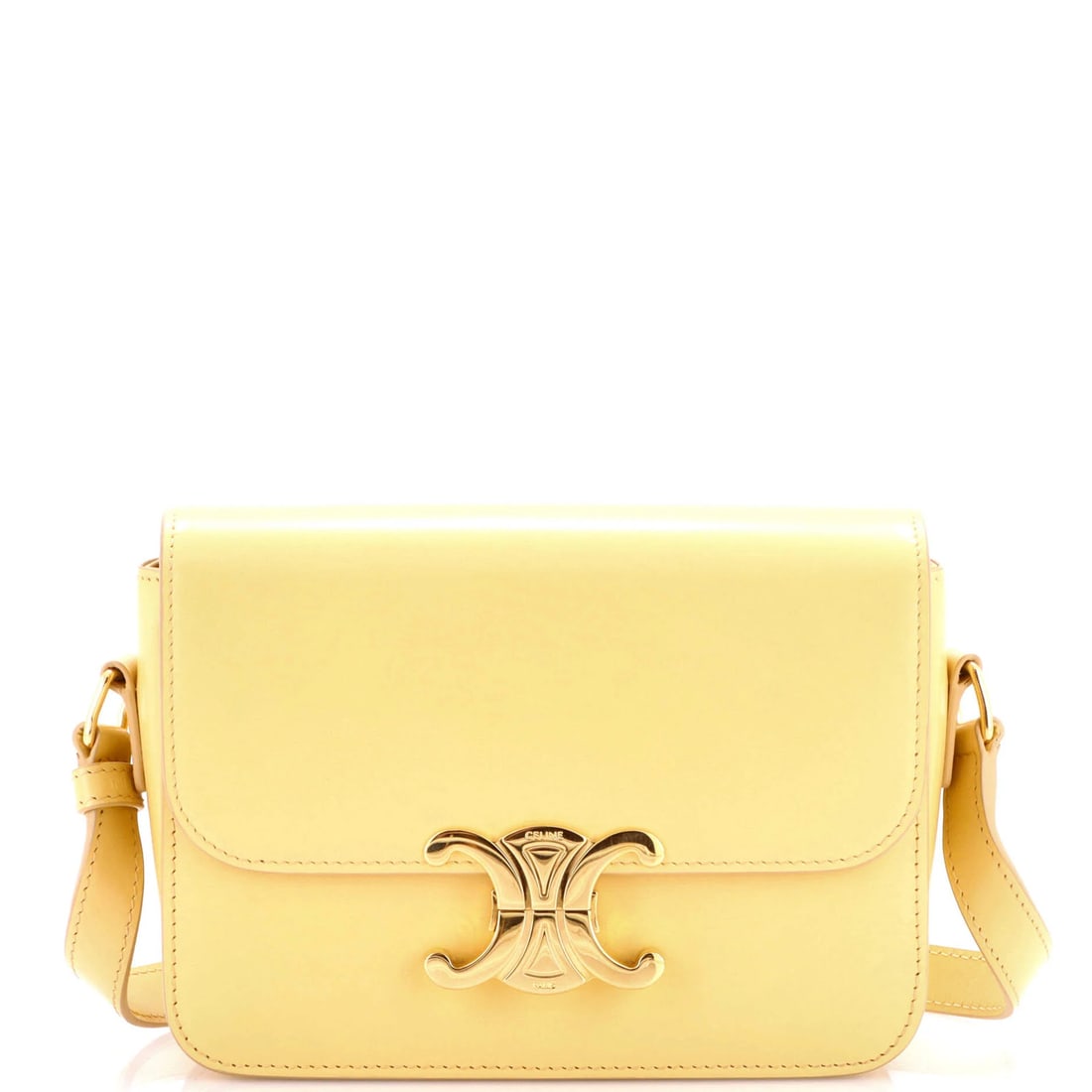 Calfskin Teen Bag Triomphe Shoulder Celine Smooth: Calfskin Teen Bag Triomphe Shoulder Celine Smooth Yellow Calfskin Triomphe Shoulder Bag with Smooth Leather Exterior, Gold Hardware and Yellow Interior. This Teen Cross Body Bag features minor