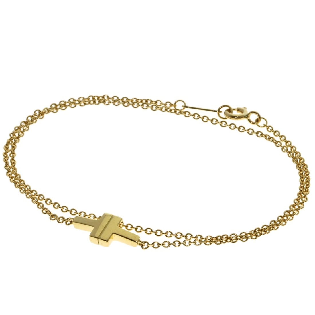 Tiffany Co T Tow Double Chain K18 Yellow Gold: Tiffany Co T Tow Double Chain K18 Yellow Gold Tiffany & Co's T Tow Double Chain K18 Yellow Gold bracelet boasts its striking gold metal exterior, crafted from high-purity K18 yellow gold. This