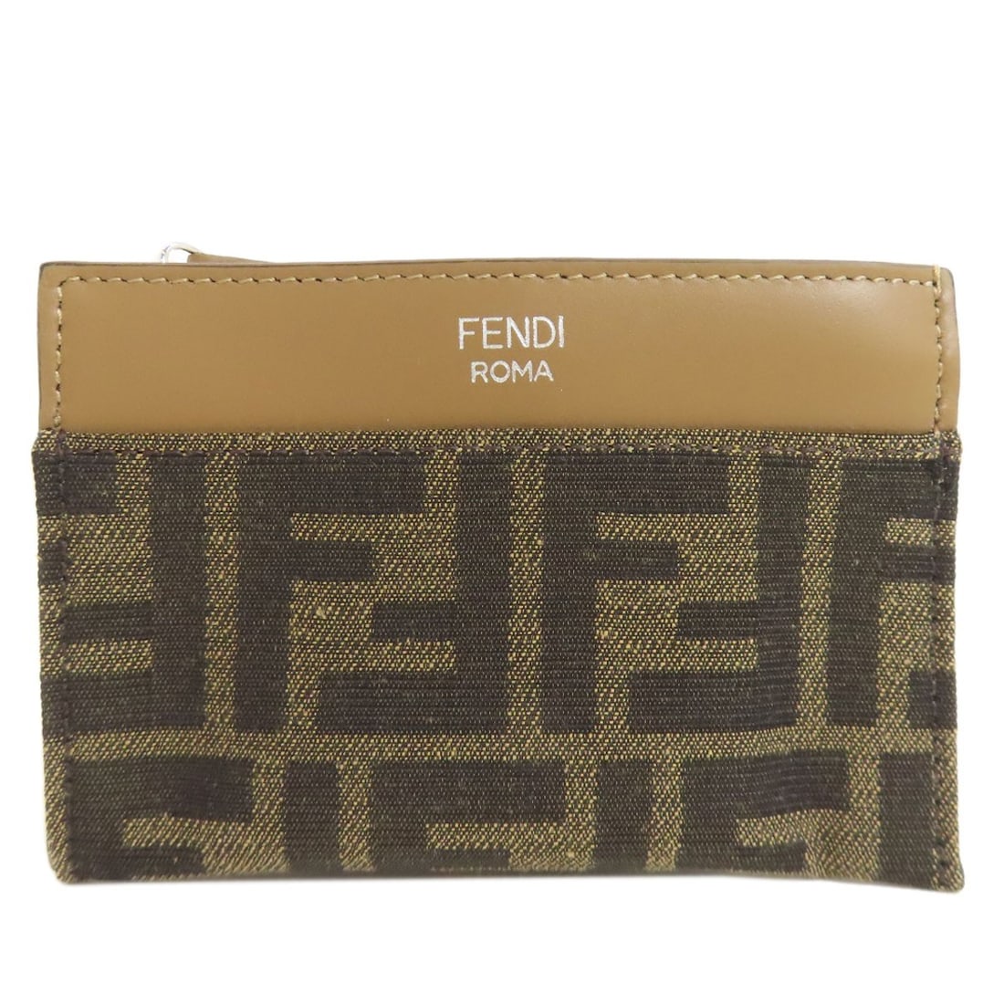Fendi Zucca Purse Coin Pattern Canvas: Fendi Zucca Purse Coin Pattern Canvas Brown canvas coin purse from Fendi features a distinctive Zucca Purse Coin Pattern. The classic design showcases the iconic pattern in a timeless brown hue,