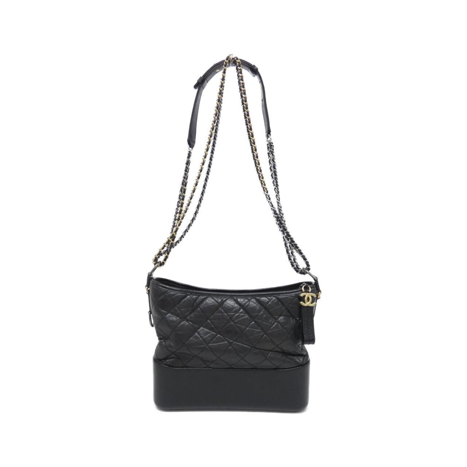 Shoulder bag leather Chanel: Shoulder bag leather Chanel This black leather Chanel shoulder bag features classic design elements, including gold and silver hardware. Made from high-quality calfskin, the bag has a timeless look an