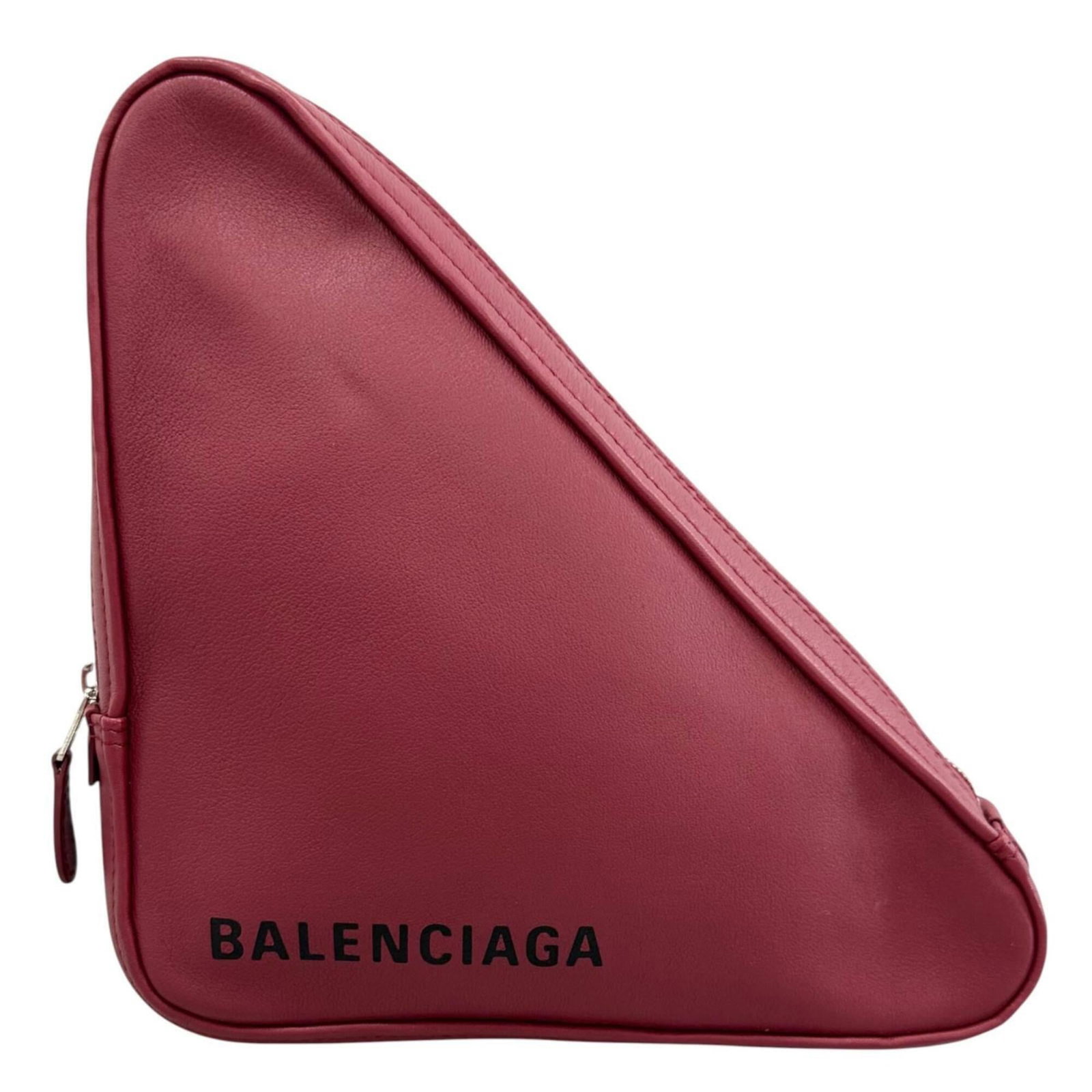 Bag clutch leather Balenciaga: Bag clutch leather Balenciaga This Balenciaga leather clutch features a bold red color and a sleek, compact design. Made from high-quality leather with some subtle scratches and minor dirt marks, it
