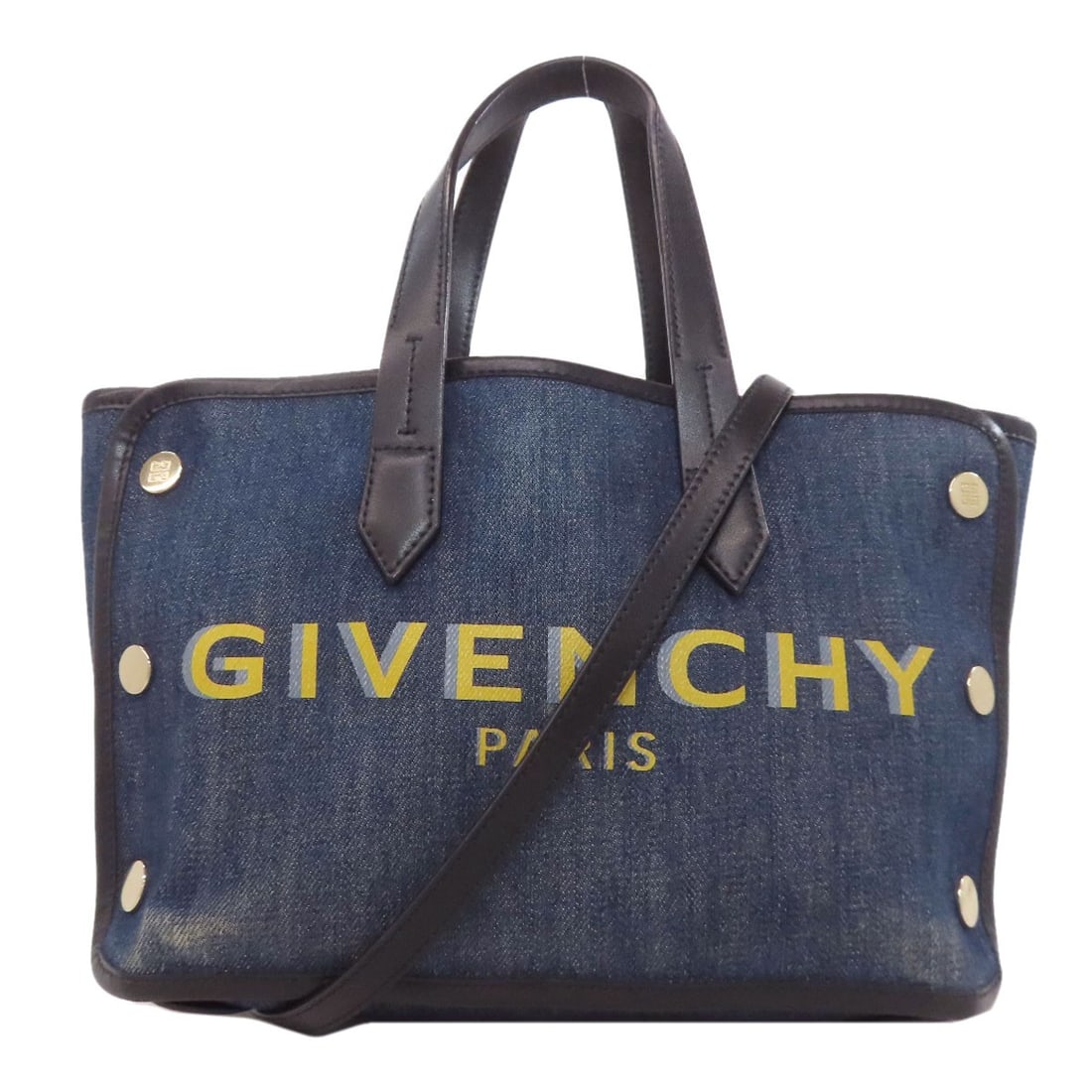 Logo Handbag Denim By Givenchy: Logo Handbag Denim By Givenchy Logo Handbag Denim By Givenchy - A statement piece with a bold blue denim exterior, featuring the iconic logo from this luxury handbag brand. The denim material gives it