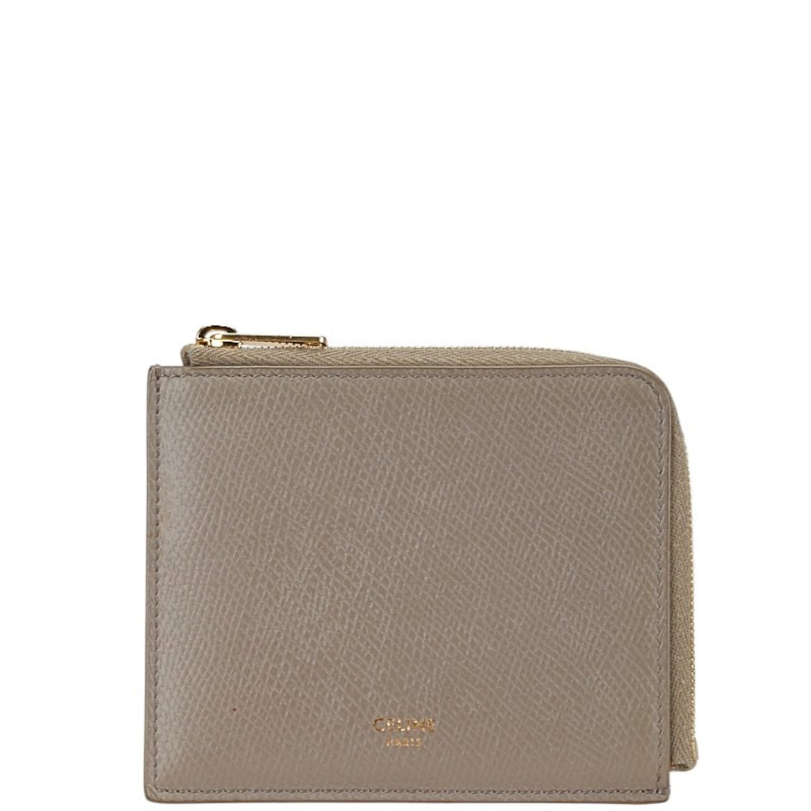 Celine Coin Purse/ Coin Case Leather: Celine Coin Purse/ Coin Case Leather The Celine Coin Purse/ Coin Case Leather is a versatile and stylish accessory, featuring a sleek gray leather design with subtle scratches and signs of usage.