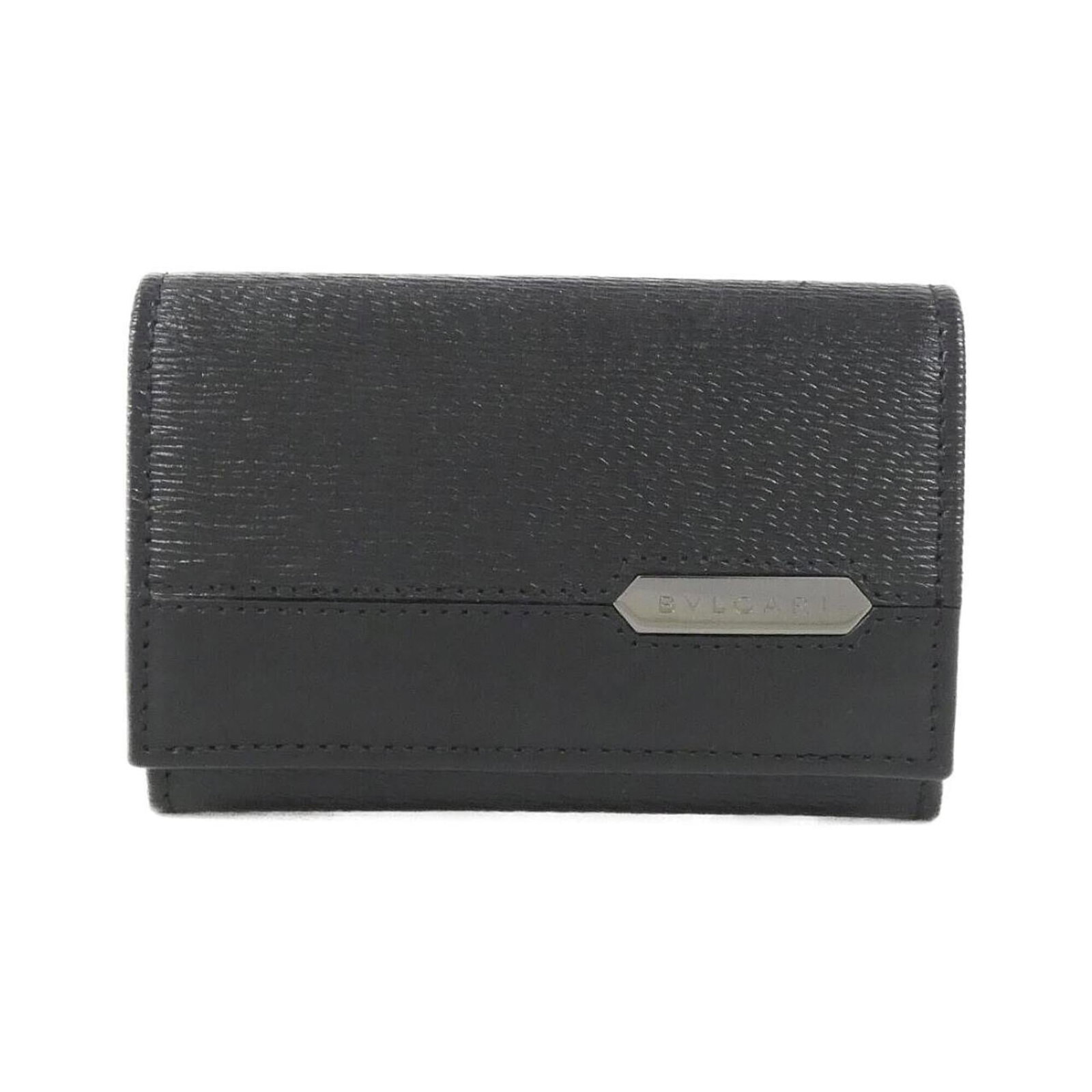 Bvlgari Coin Purse/ Coin Case Leather: Bvlgari Coin Purse/ Coin Case Leather Bvlgari Coin Purse/Coin Case Leather - A sleek and sophisticated accessory from the renowned Italian luxury brand, crafted from high-quality calfskin leather in