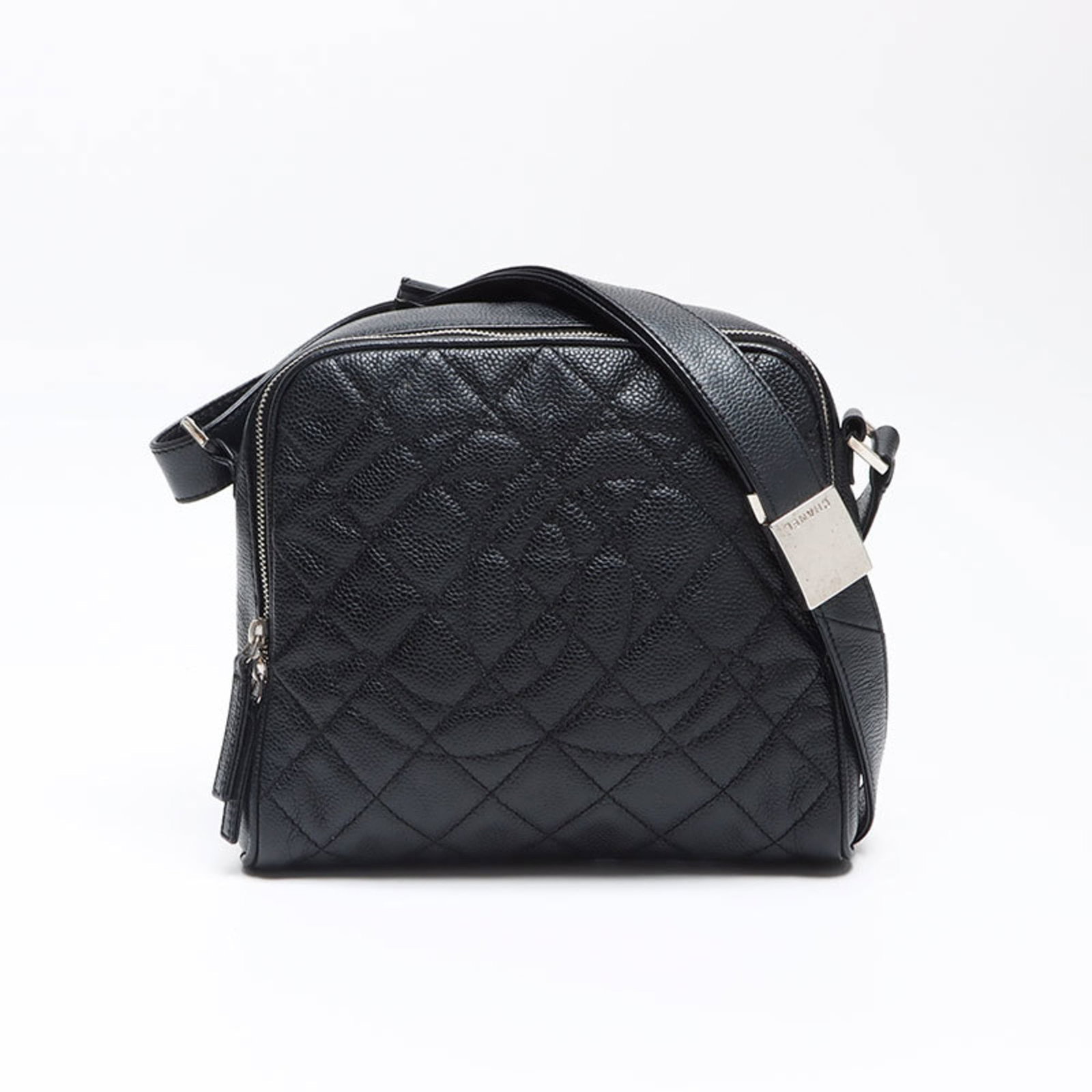 Shoulder Bag by Chanel: Shoulder Bag by Chanel Black Chanel shoulder bag with a classic design, measuring 19cm x 21.5cm x 6cm, in very good condition despite some minor scratches and dirt. The bag's condition reflects its us