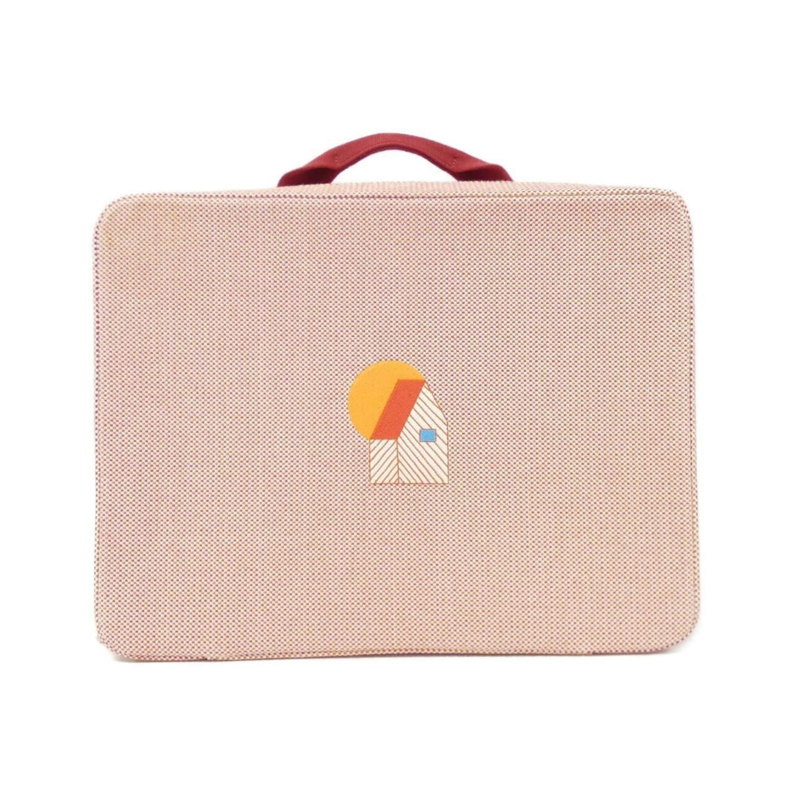 Handbag from Hermes: Handbag from Hermes Pink canvas handbag from Hermes, measuring 24cm x 31cm x 12.5cm, features a few traces of usage with some scratches and dirt visible but remains in very good condition. The bag's